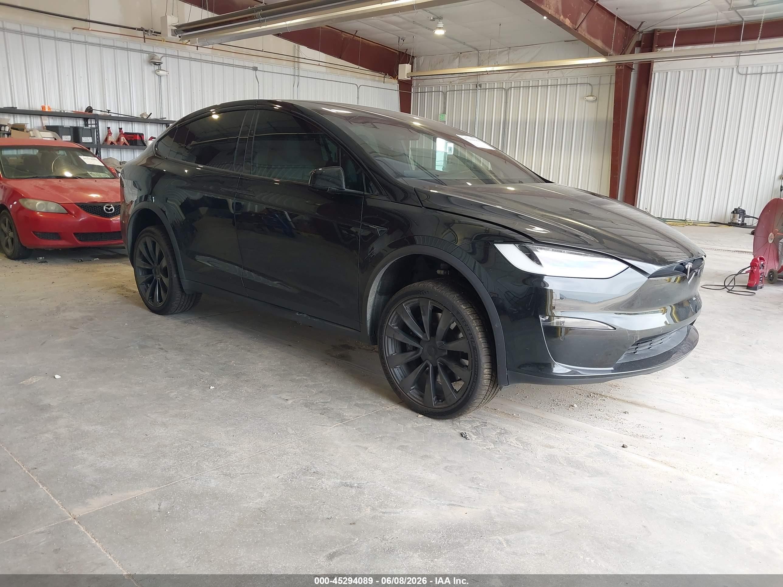 2022 Tesla Model X Plaid, VIN 7SAXCBE60NF343904 — Side