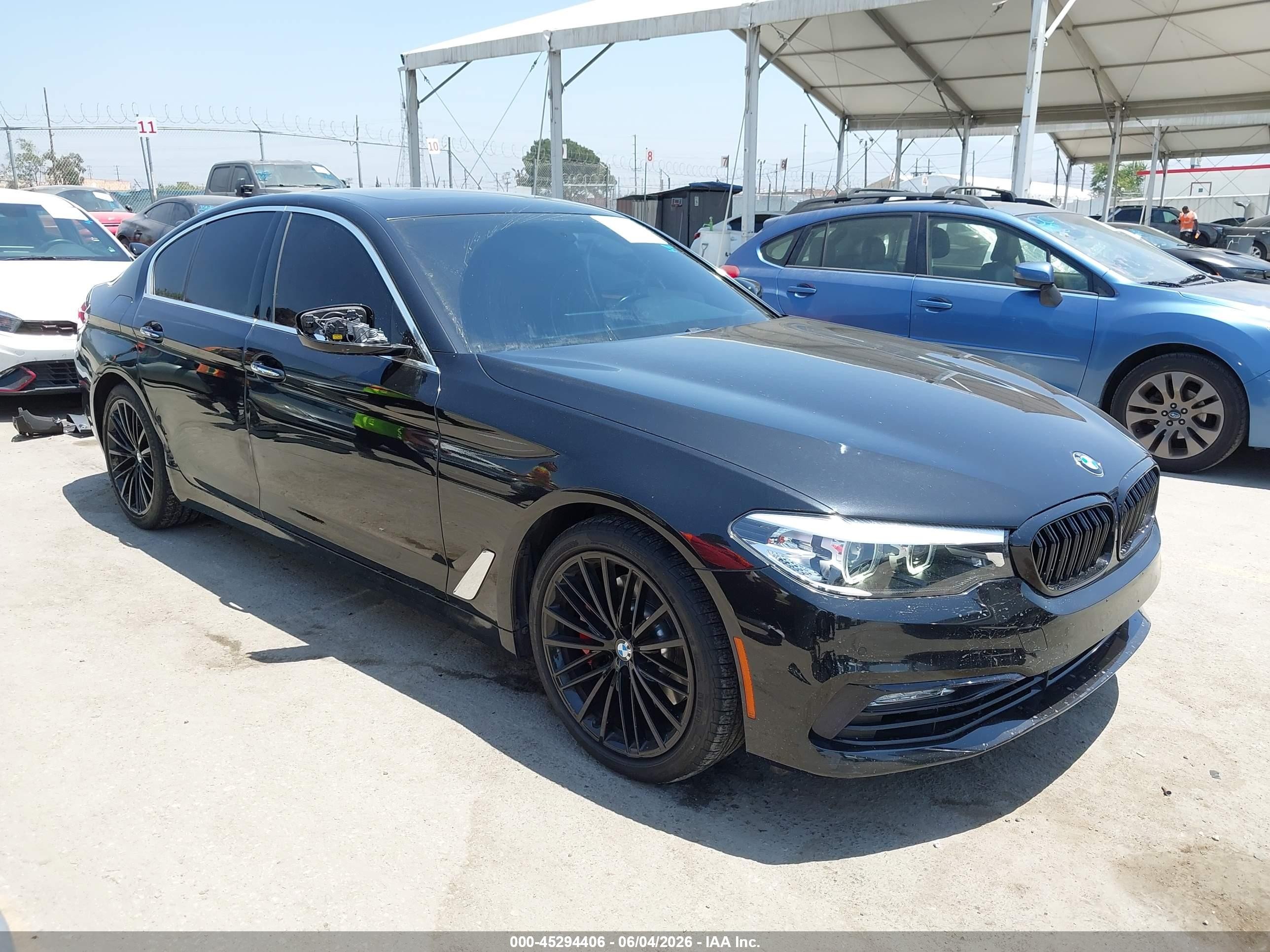 2018 BMW 5 Series 540i, VIN WBAJE5C57JWA97447 — Side