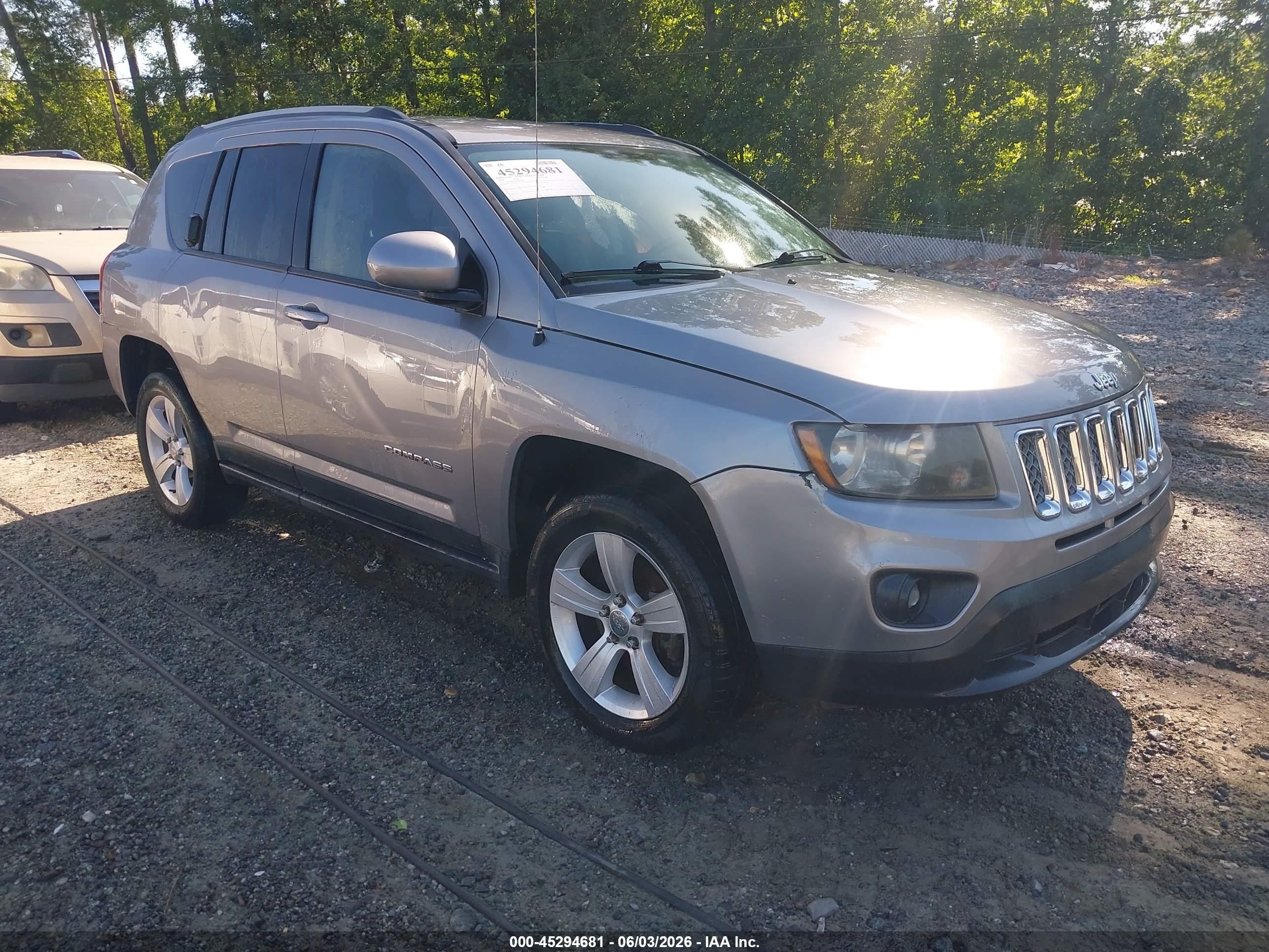 2016 Jeep Compass High Altitude, VIN 1C4NJCEAXGD615048 — Side