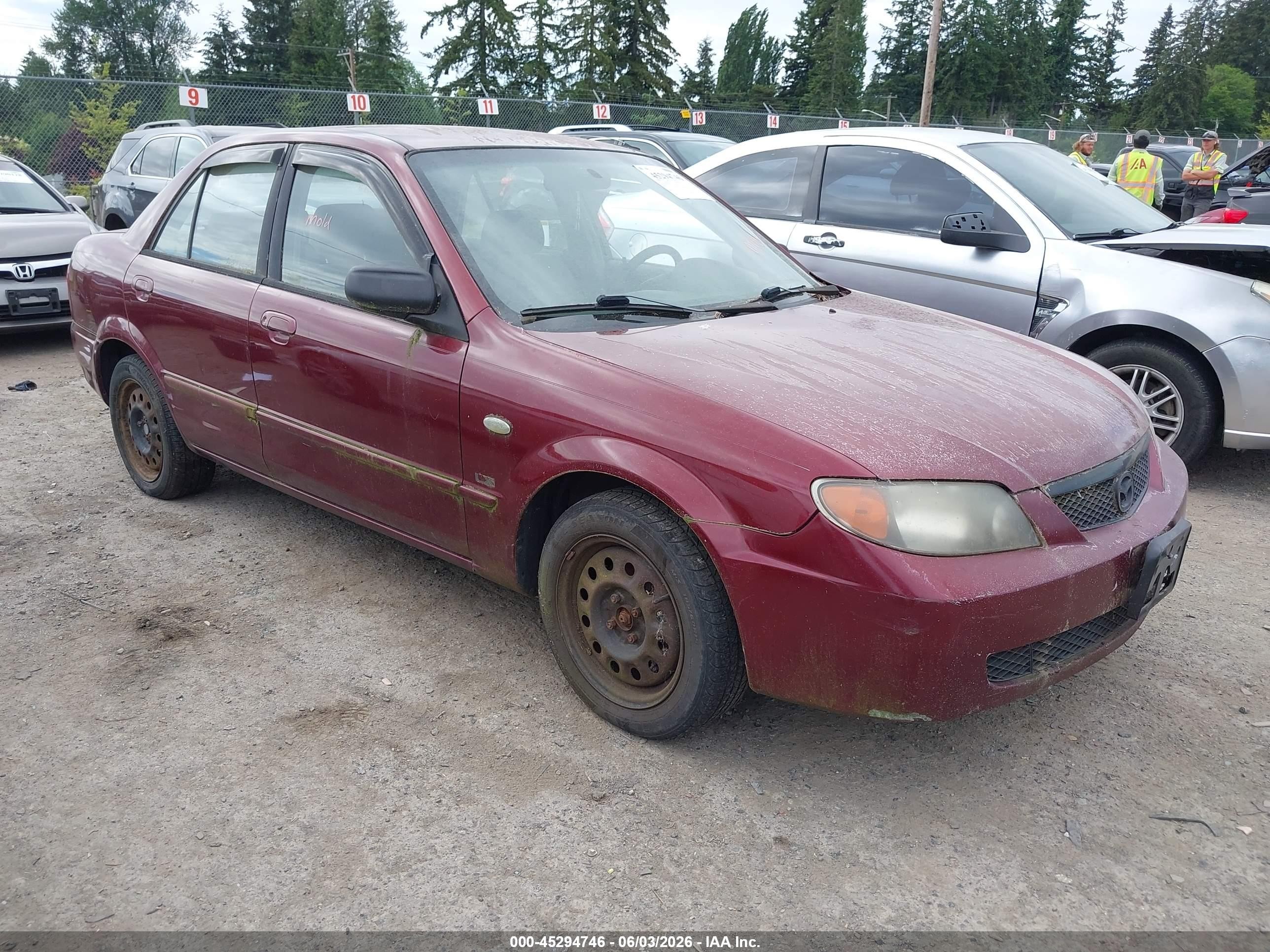 2002 Mazda Protege DX, VIN JM1BJ225621617488 — Normal wear