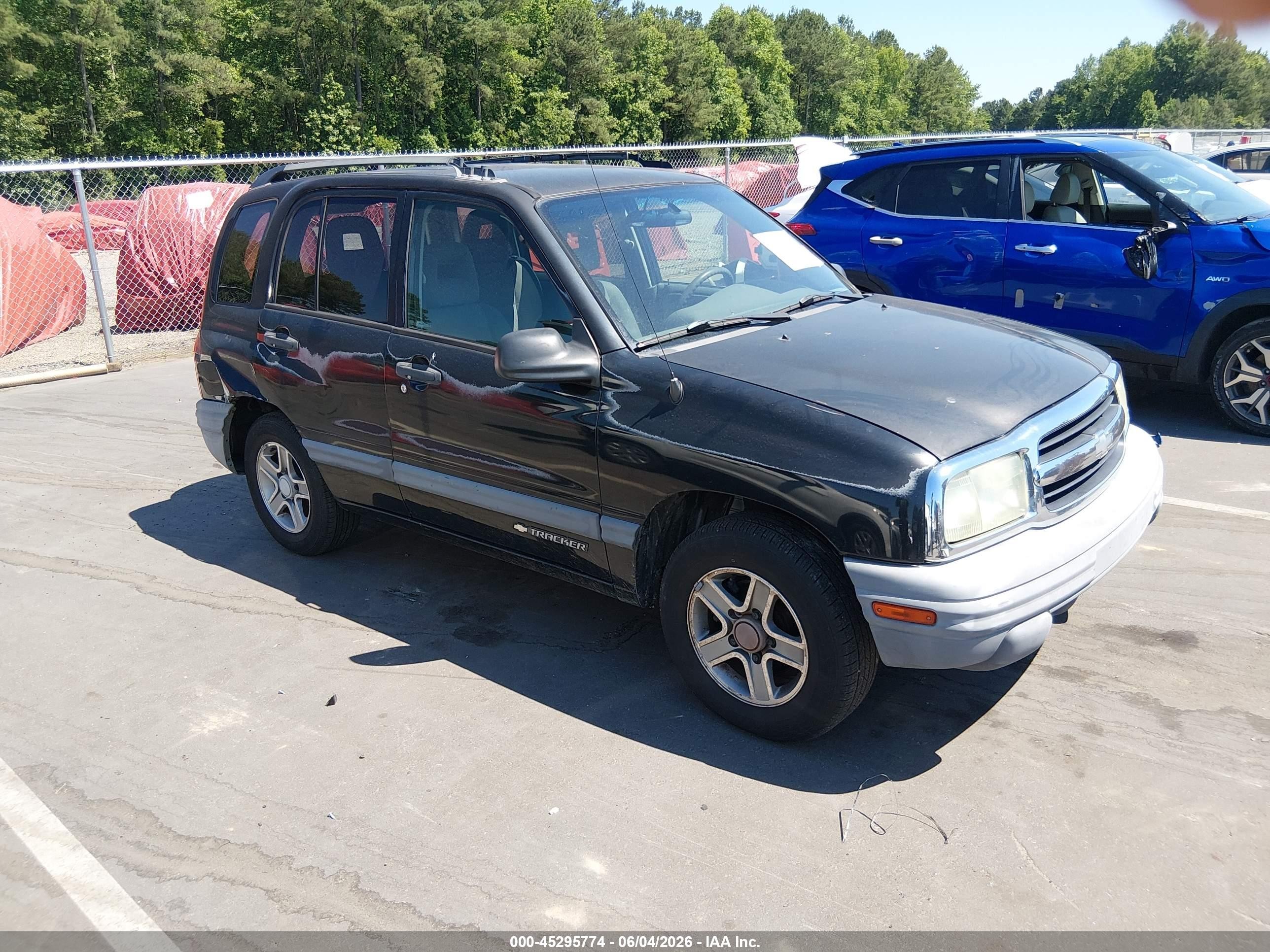 2003 Chevrolet Tracker, VIN 2CNBE13C236950860 — Rear end