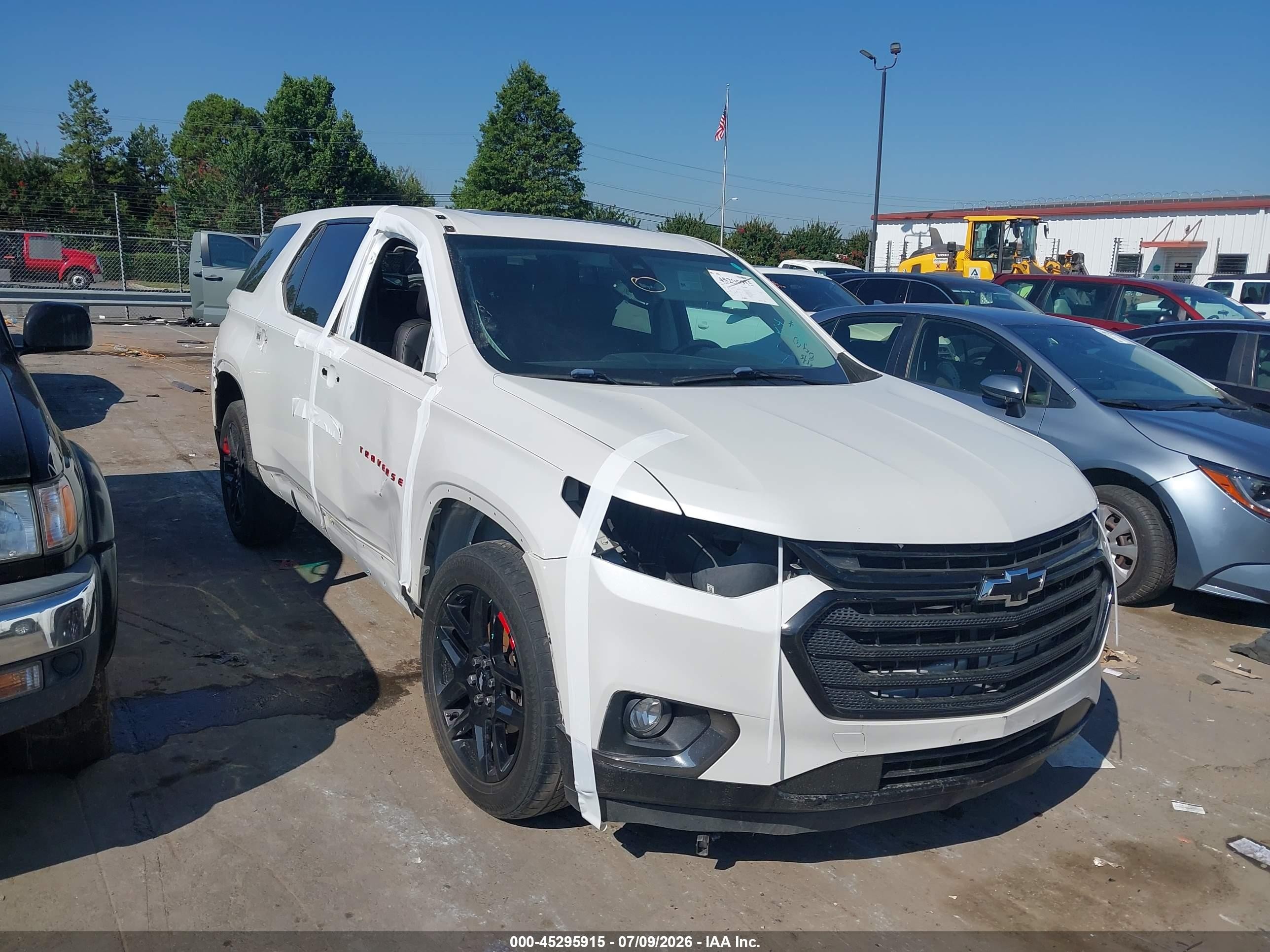 2018 Chevrolet Traverse Premier, VIN 1GNEVJKW6JJ258525 — Side