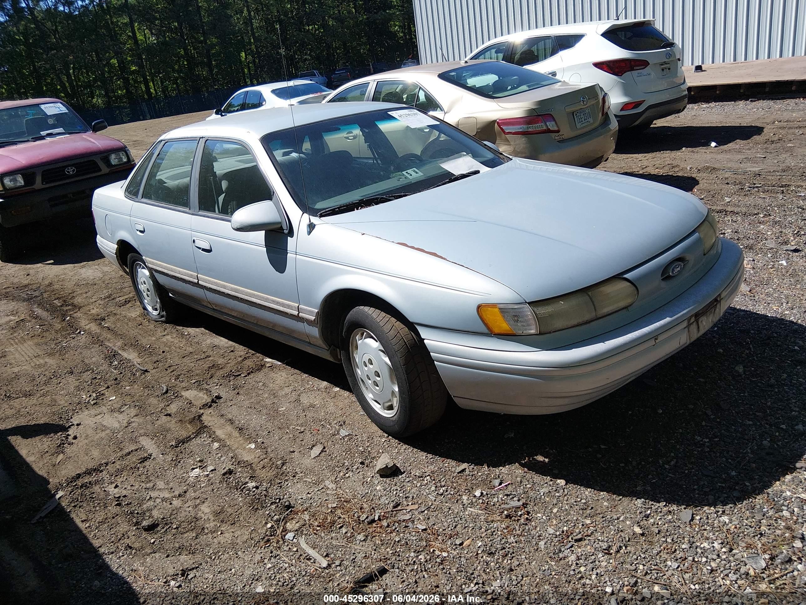 1994 Ford Taurus GL, VIN 1FALP5242RA290535 — Normal wear