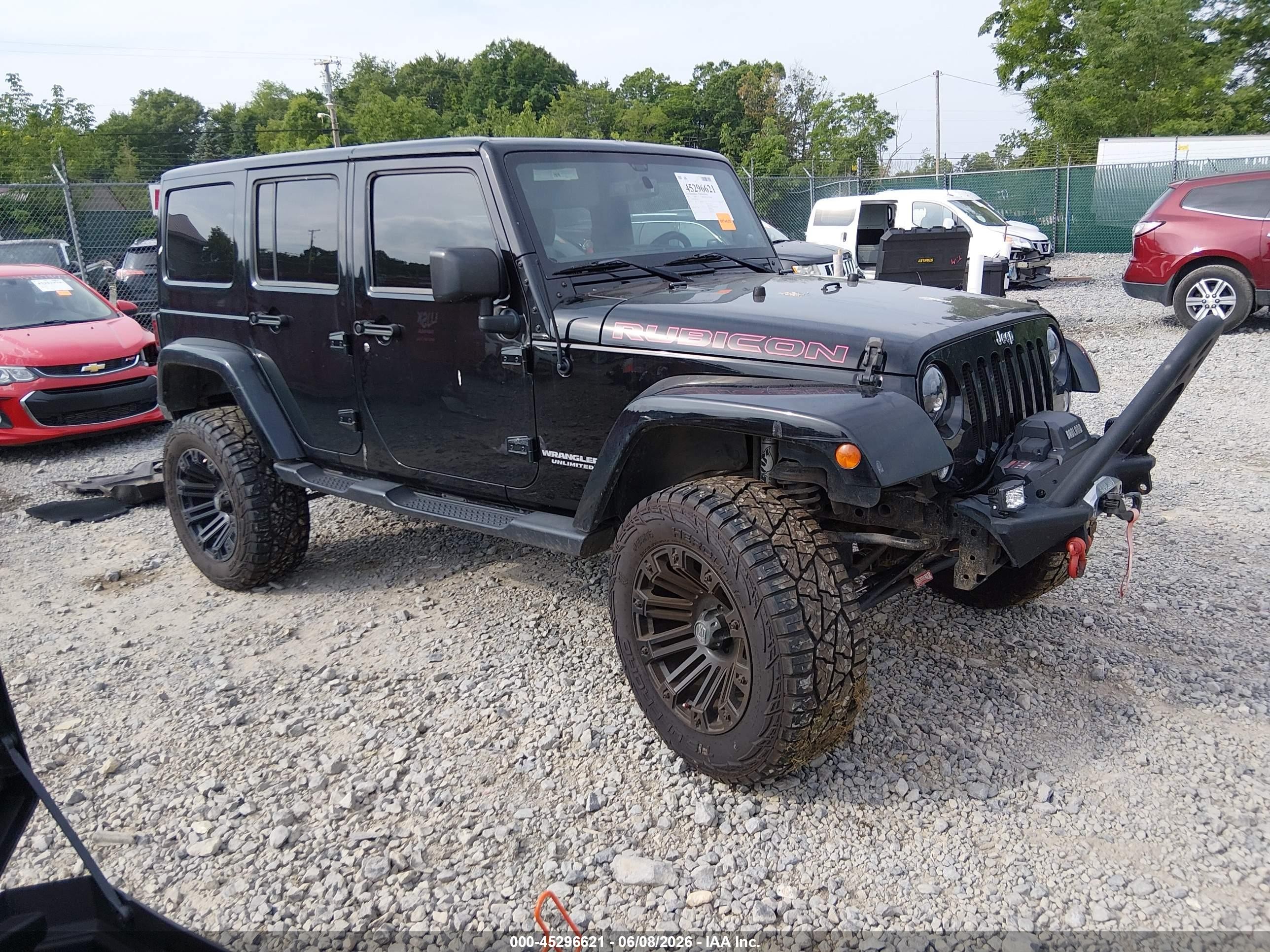 2014 Jeep Wrangler Unlimited Rubicon, VIN 1C4BJWFG9EL296171 — Side