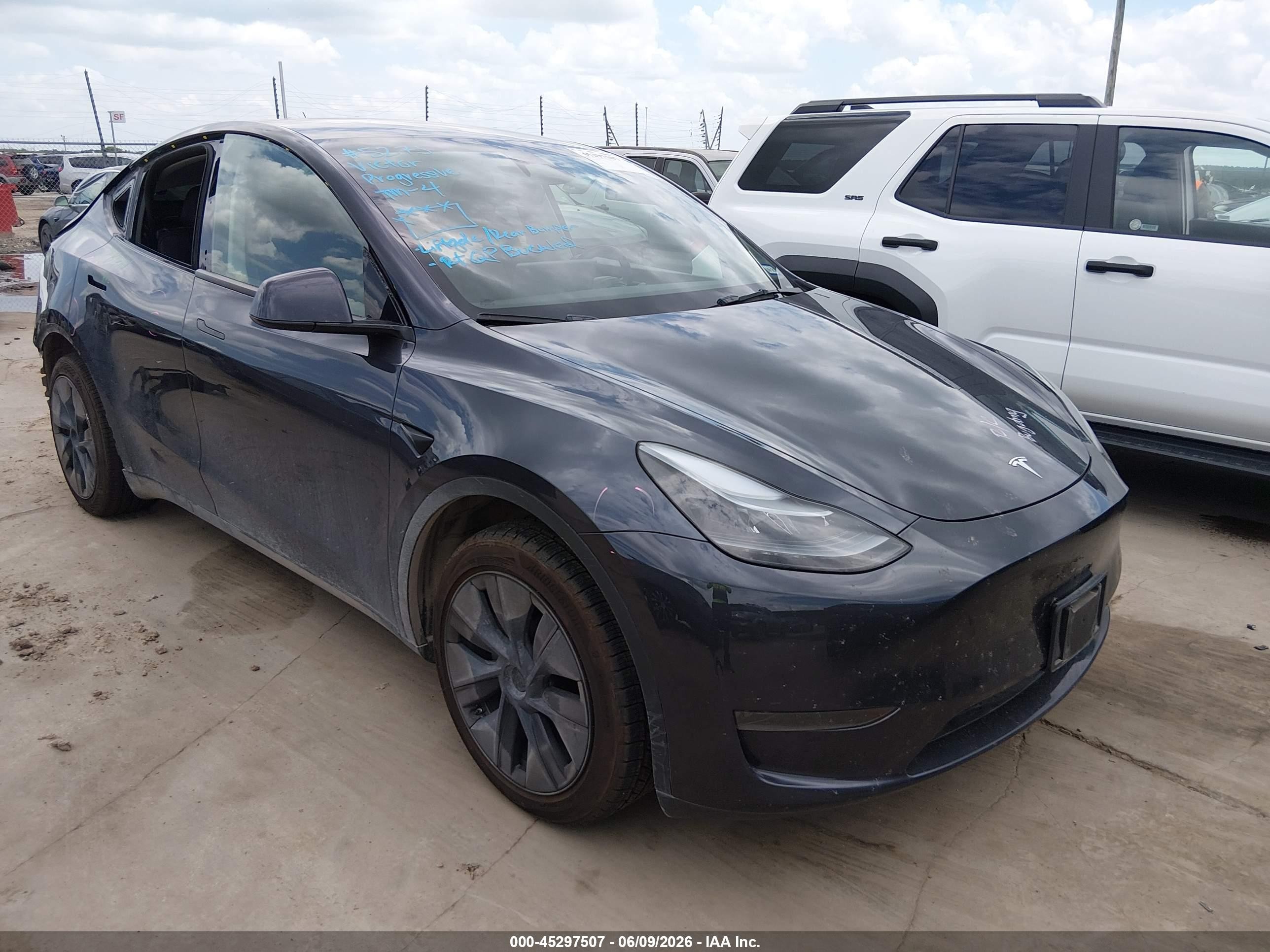 2024 Tesla Model Y, VIN 7SAYGDED7RA296540 — Rear end