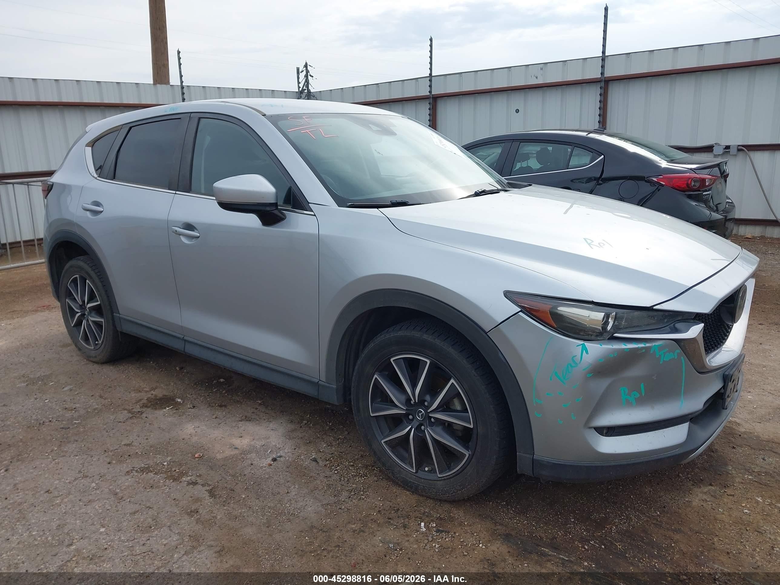 2018 Mazda CX-5 Touring, VIN JM3KFBCMXJ0472734 — Hail