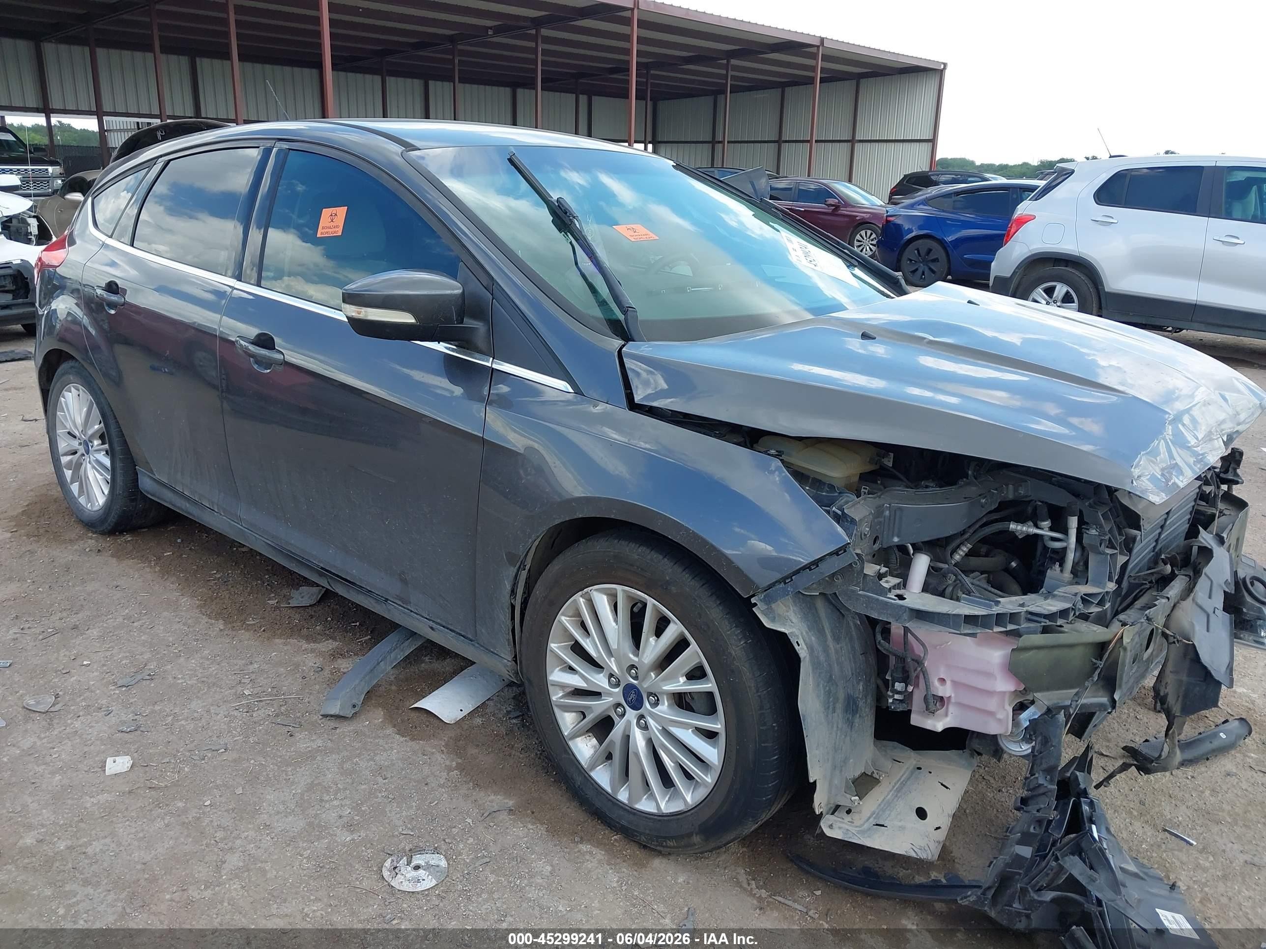 2015 Ford Focus Titanium, VIN 1FADP3N28FL361384 — Biohazard / chemical