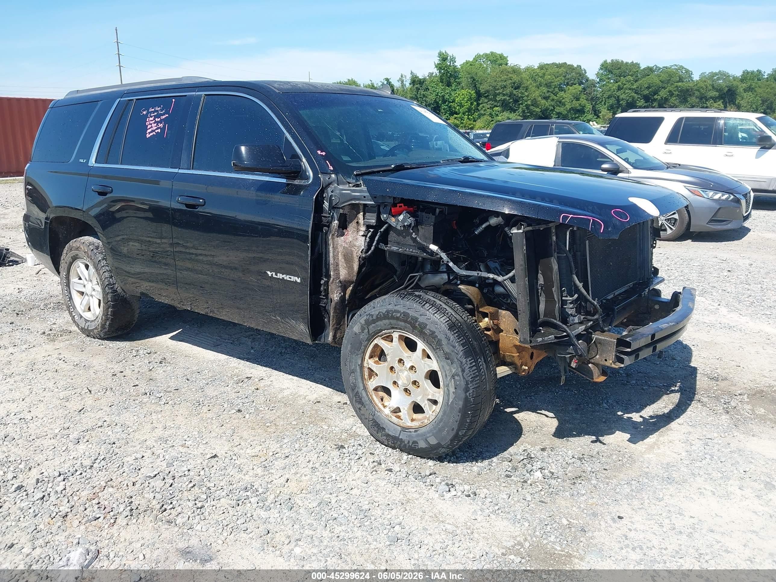 2015 GMC Yukon SLT, VIN 1GKS1BKC5FR136559 — Front end