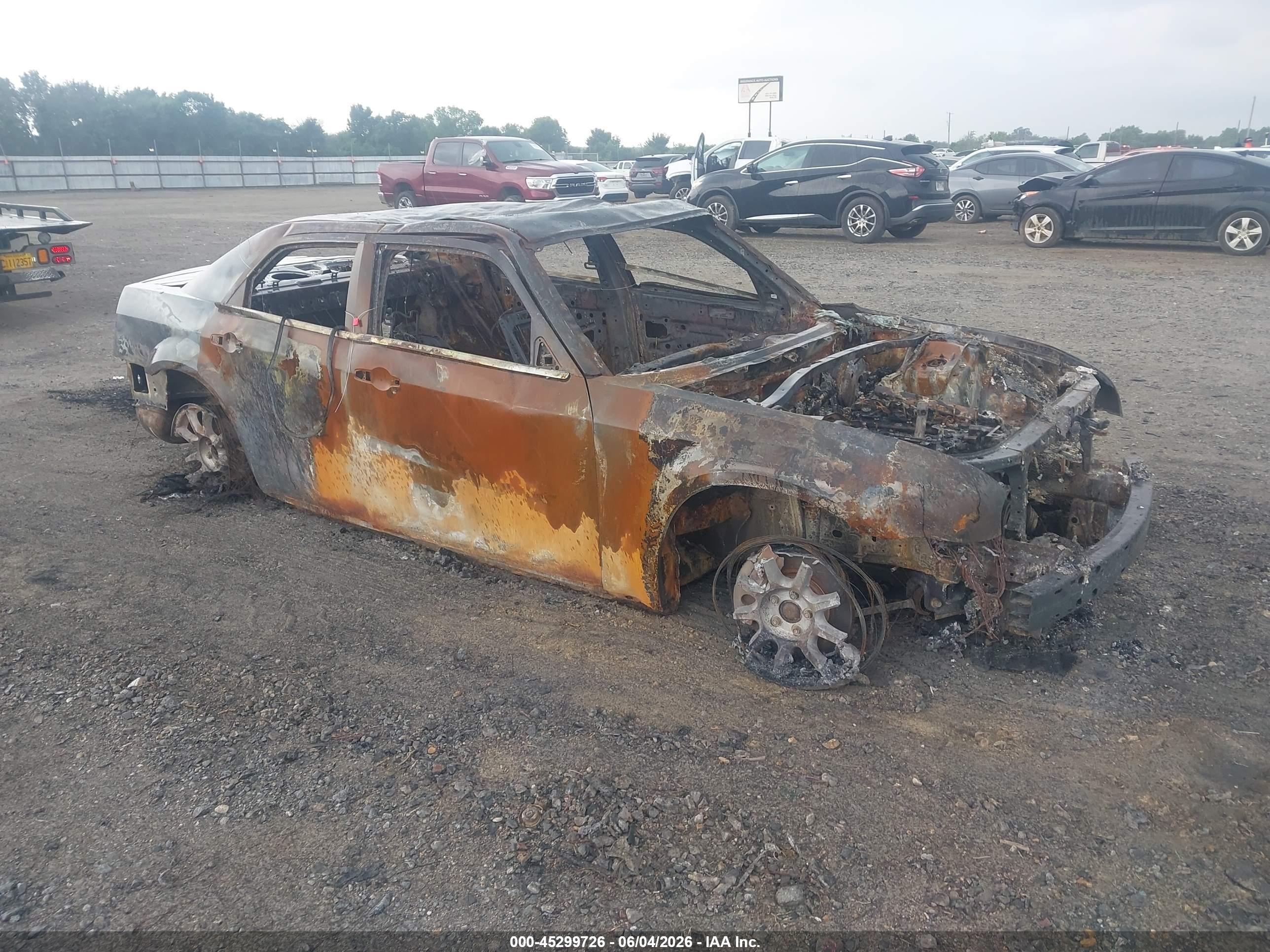 2009 Chrysler 300 C Hemi, VIN 2C3KA63T79H564711 — Пожар
