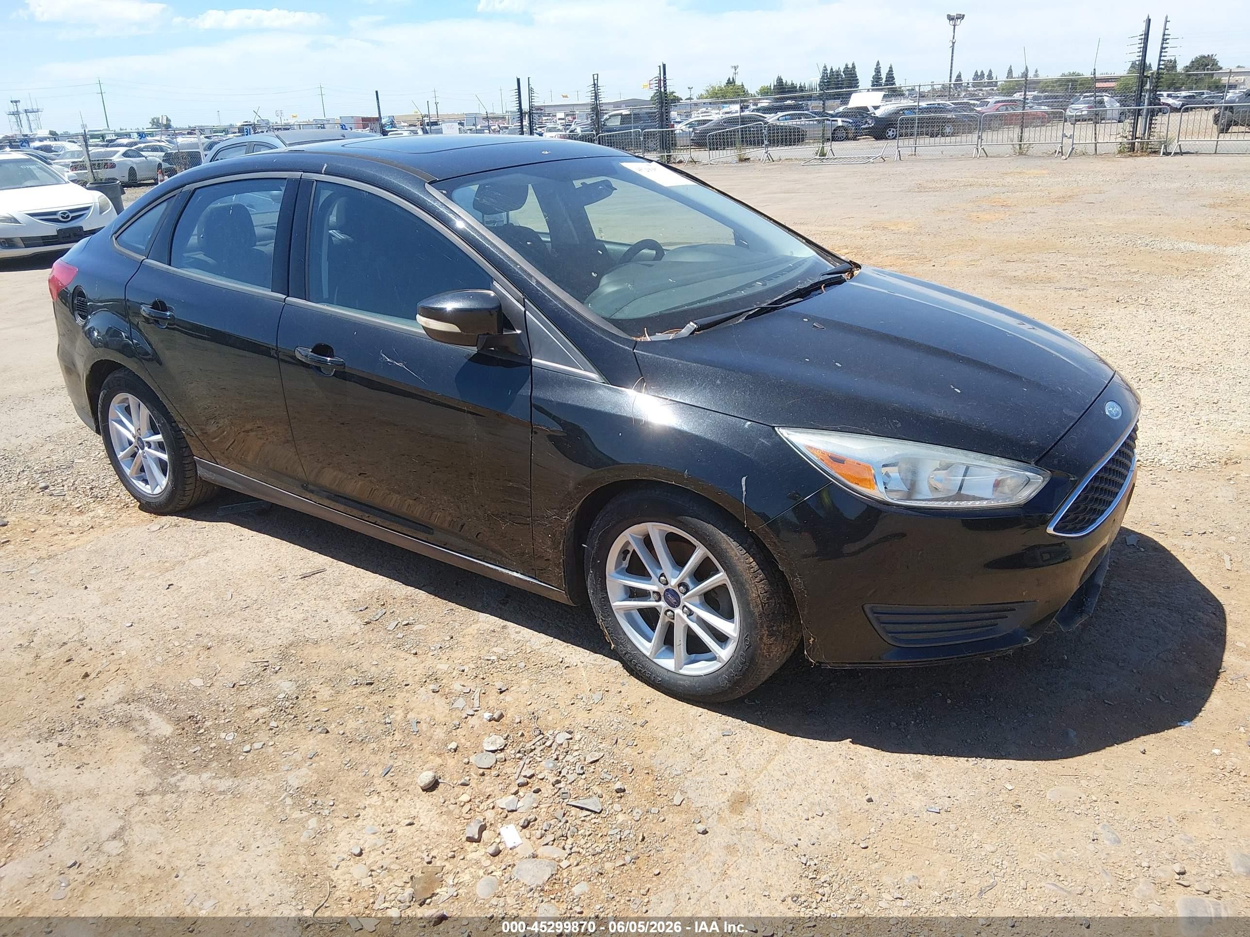 2015 Ford Focus SE, VIN 1FADP3F23FL244035 — Normal wear