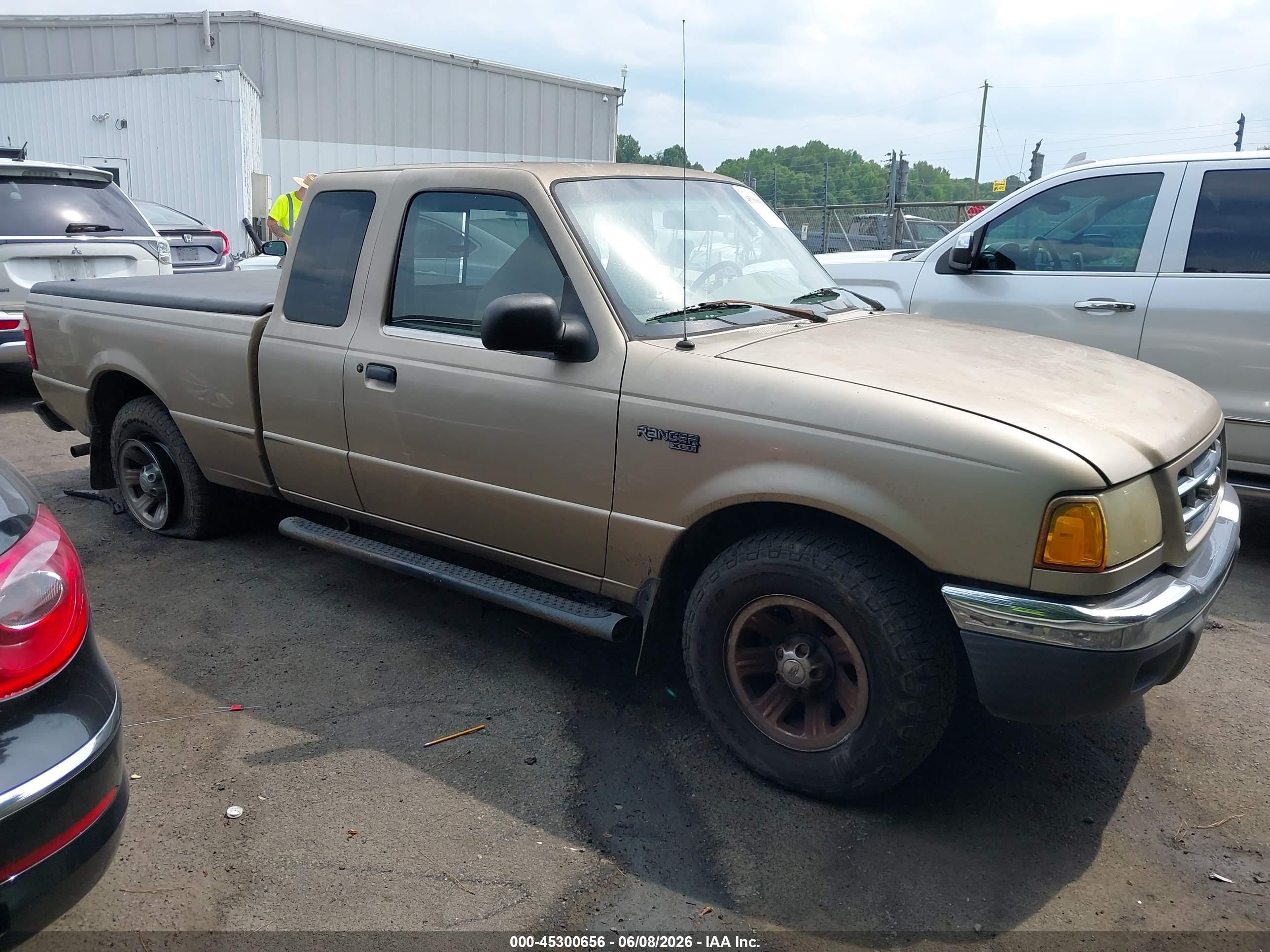 2002 Ford Ranger XL Fleet, VIN 1FTYR44U22PA92185 — Side