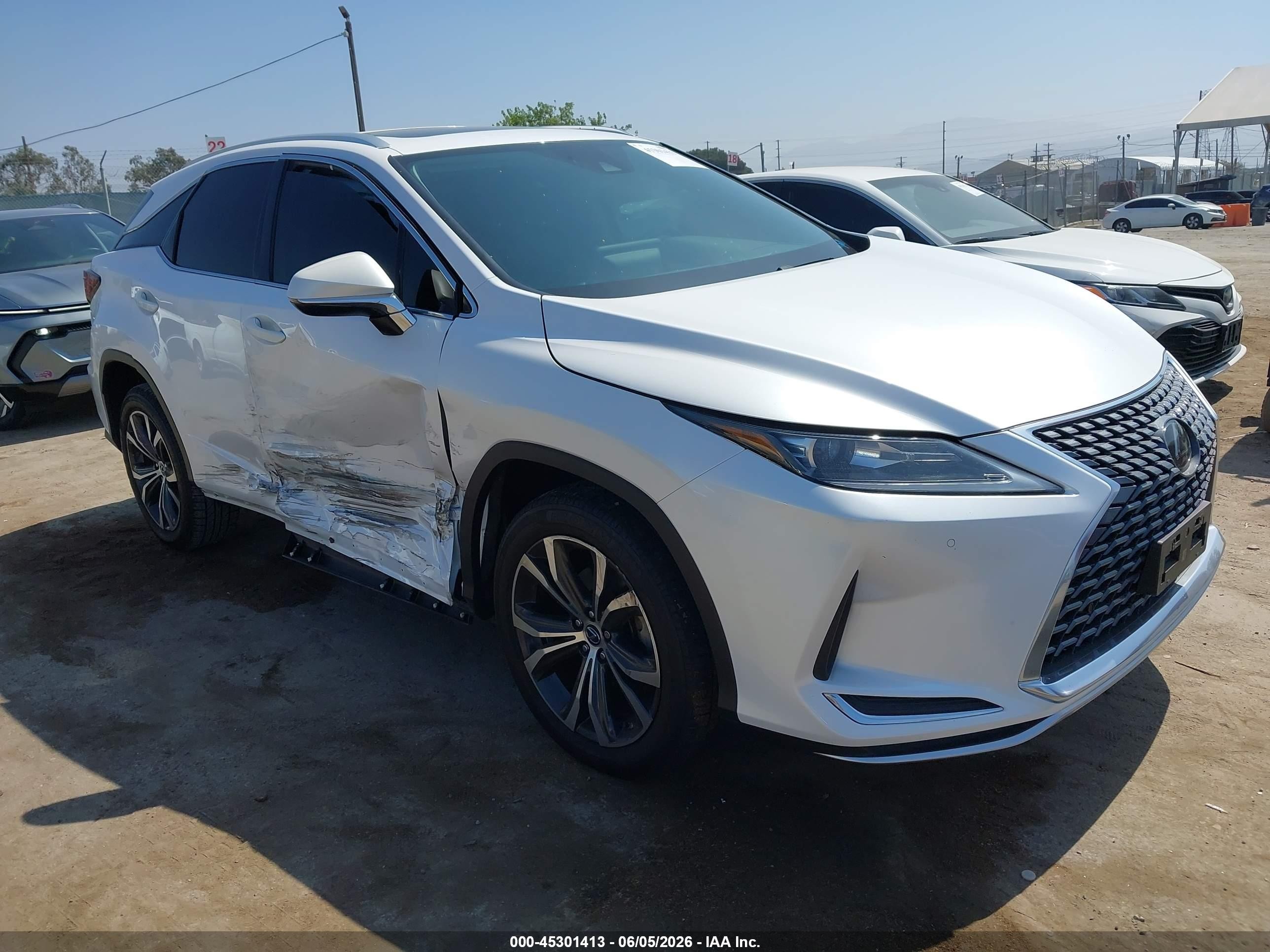 2021 Lexus RX 350, VIN 2T2HZMAA7MC202588 — Бок