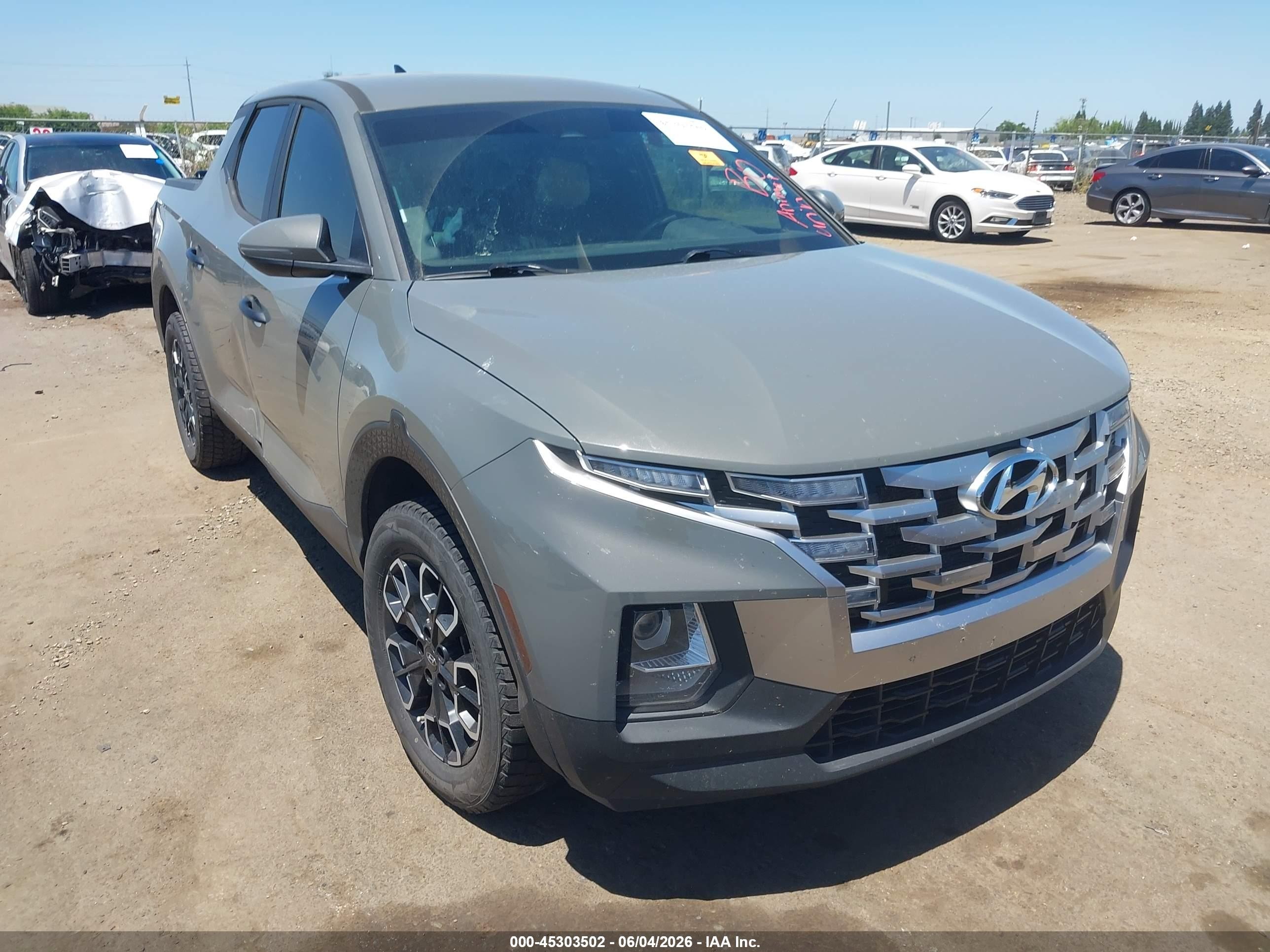 2022 Hyundai Santa Cruz SEL, VIN 5NTJBDAE5NH009448 — Side