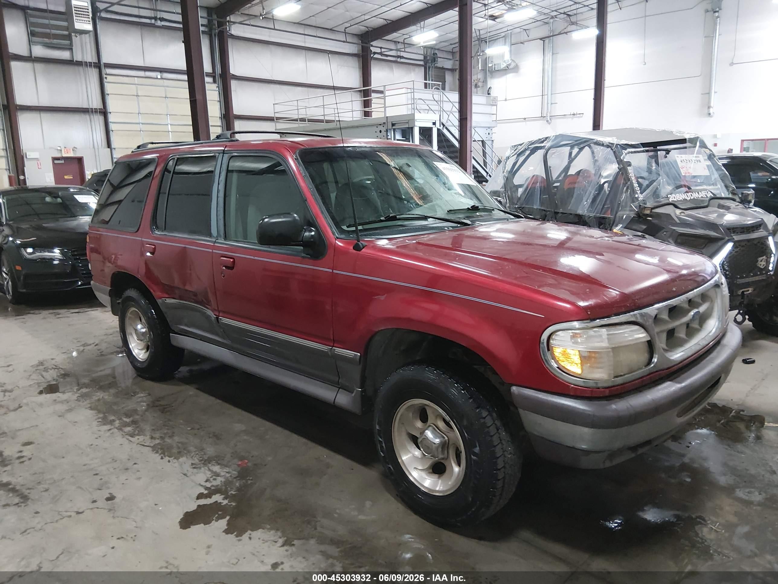 1997 Ford Explorer XL, VIN 1FMDU34E0VUD16684 — Side