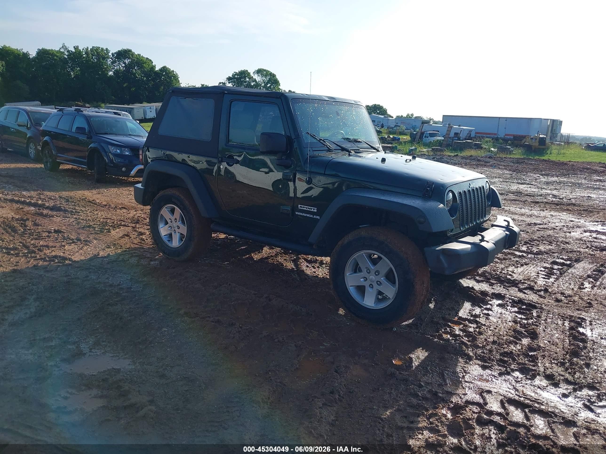 2010 Jeep Wrangler Sport, VIN 1J4AA2D19AL204600 — Hail