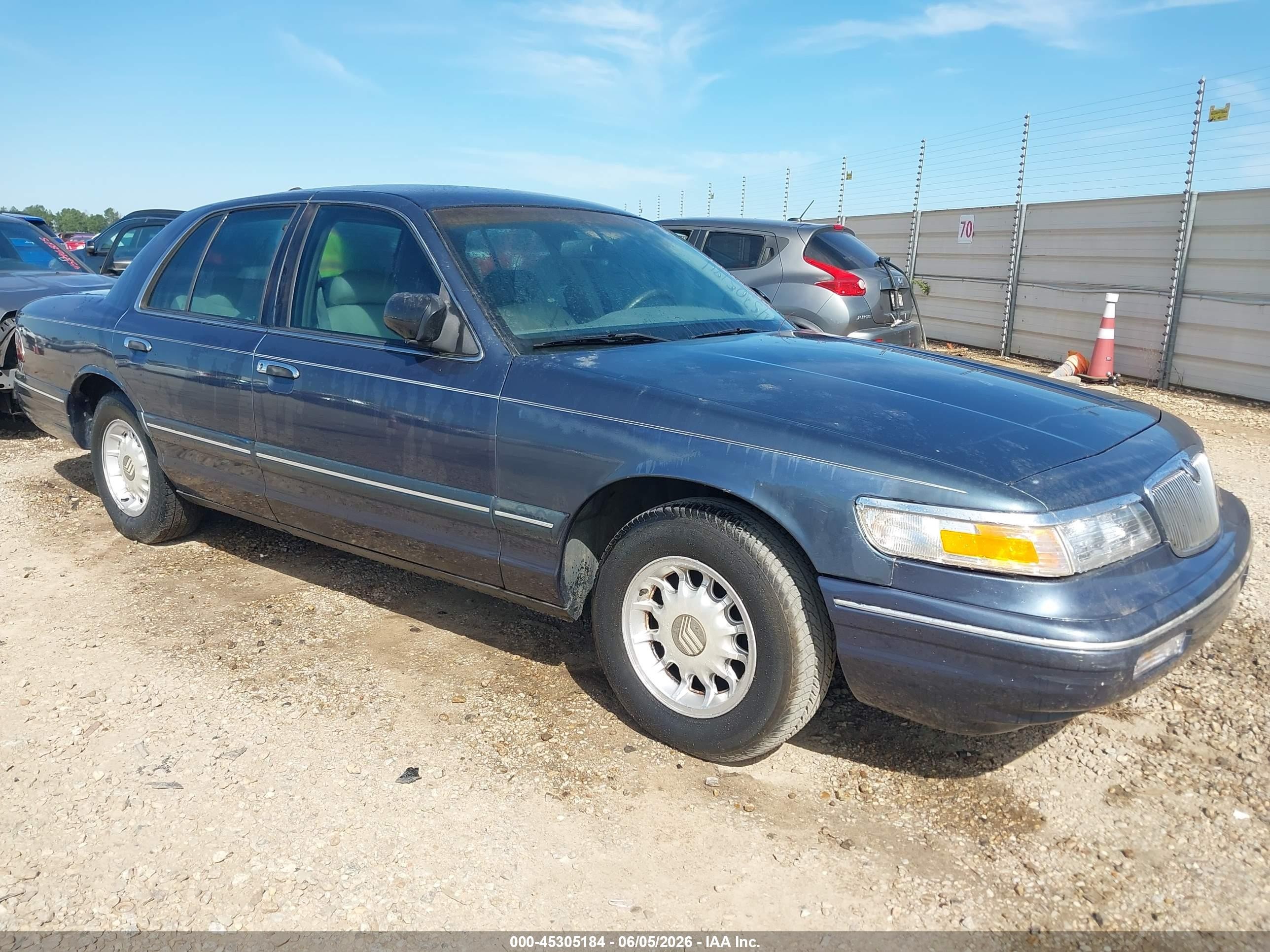 1997 Mercury Grand Marquis LS, VIN 2MELM75W8VX704333 — Rear end