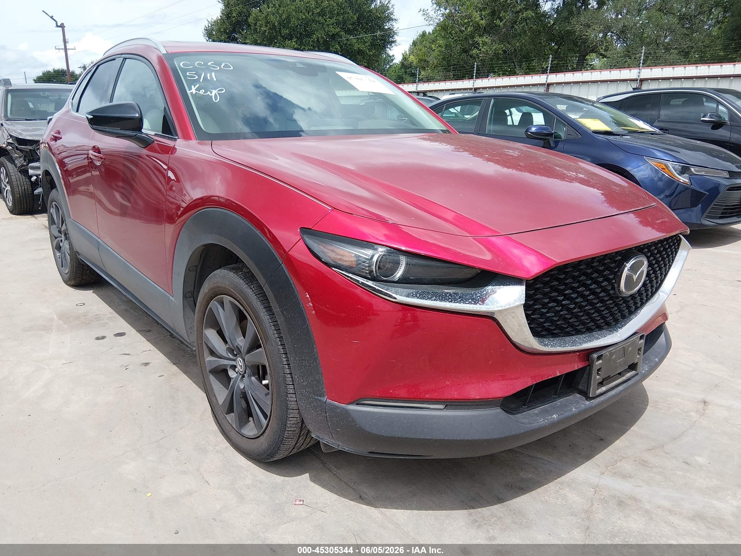 2023 Mazda CX-30 Premium, VIN 3MVDMBDY0PM502384 — Side