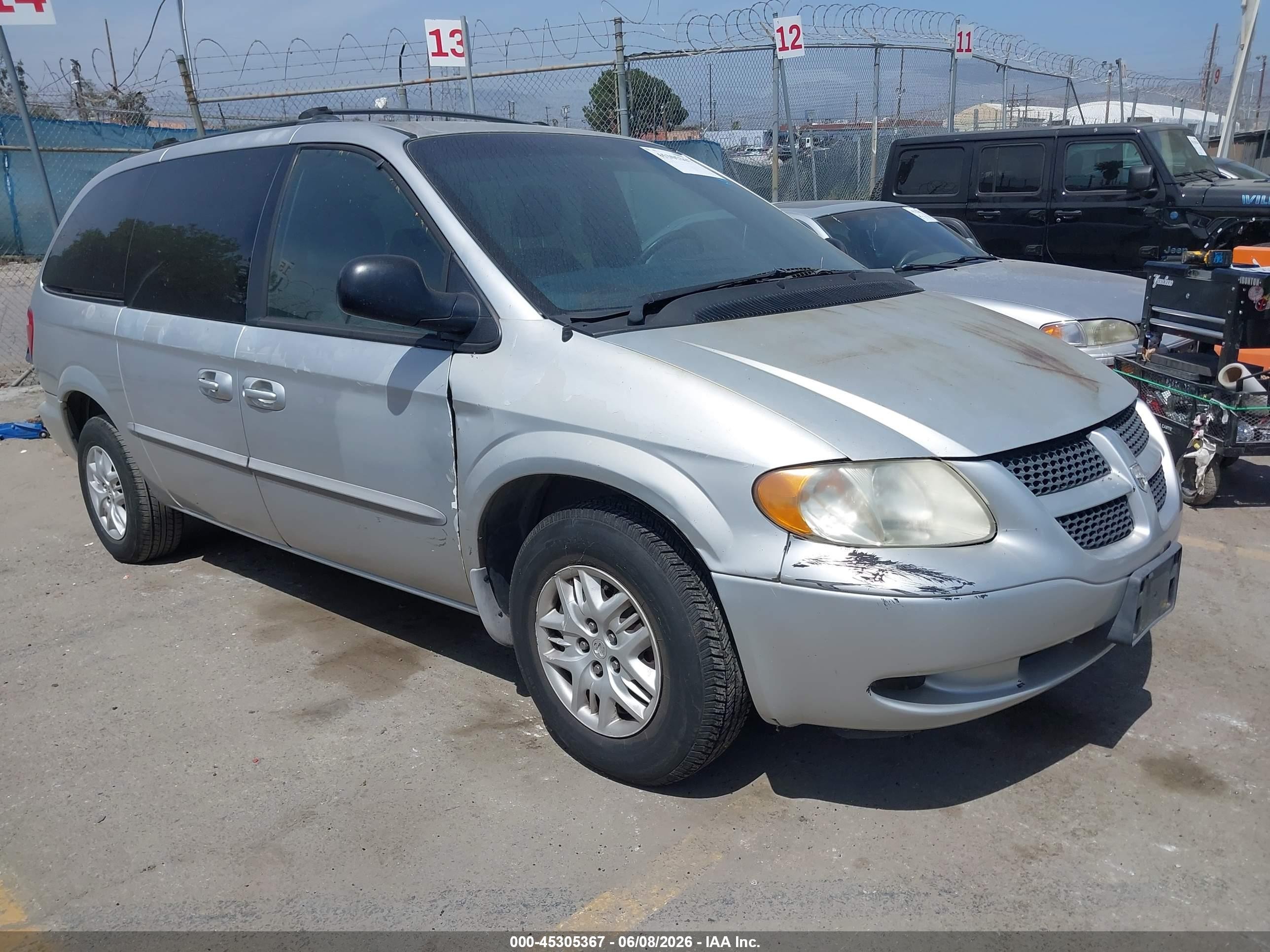 2001 Dodge Caravan Sport, VIN 2B4GP44311R203683 — Бок