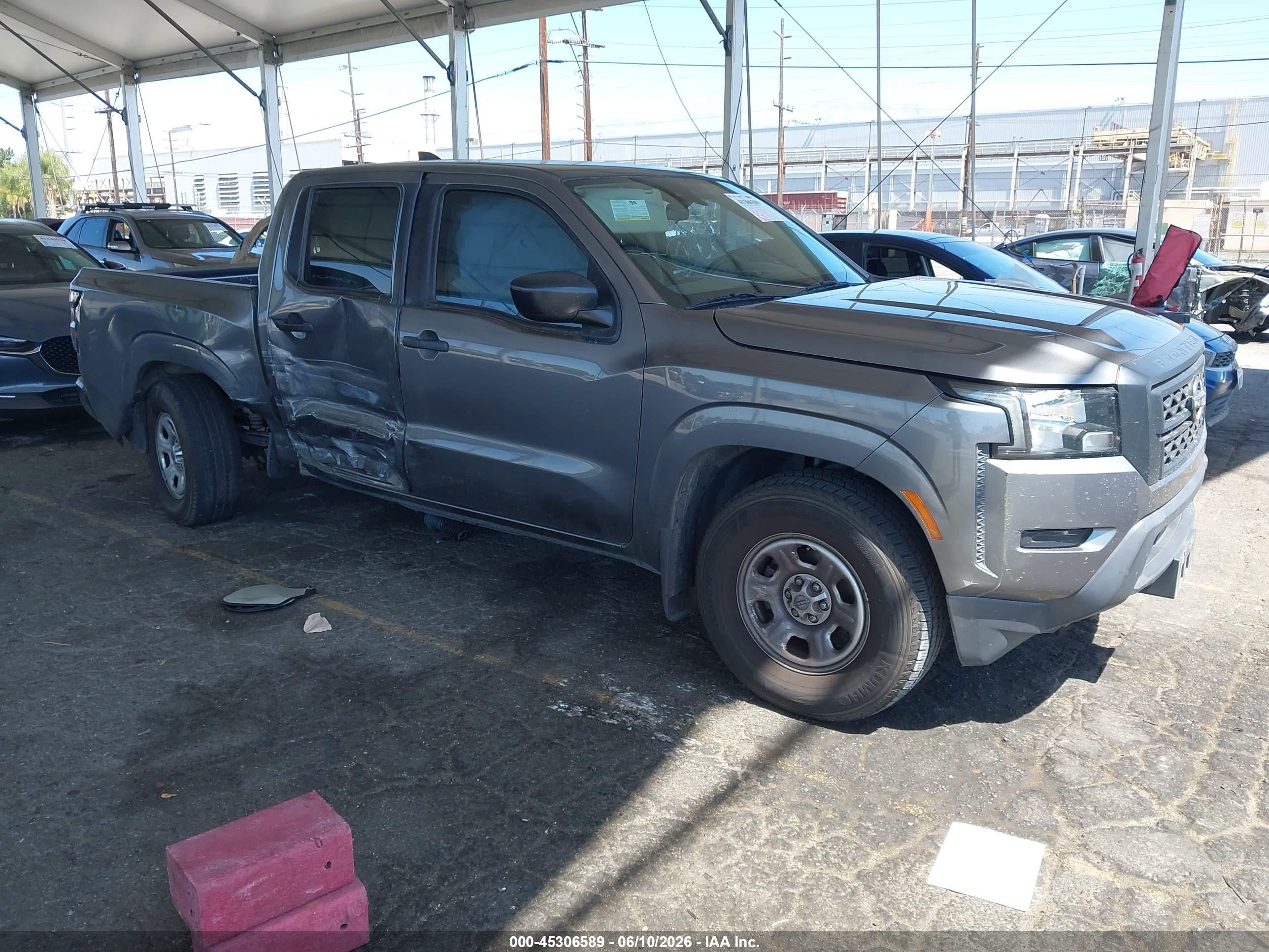 2022 Nissan Frontier Pro-X, VIN 1N6ED1EJ0NN614734 — Side