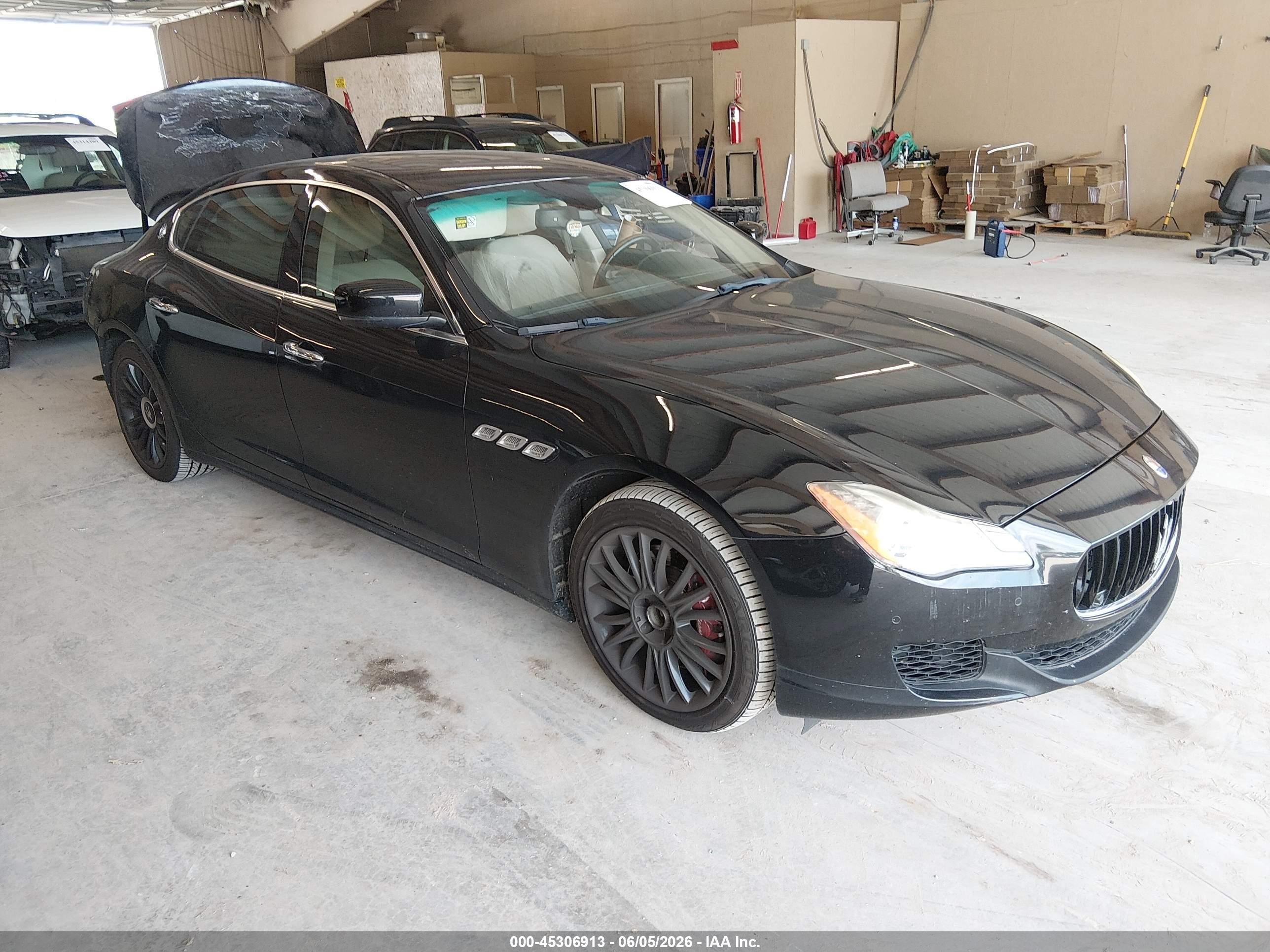 2014 Maserati Quattroporte S Q4, VIN ZAM56RRA3E1111434 — Rear end