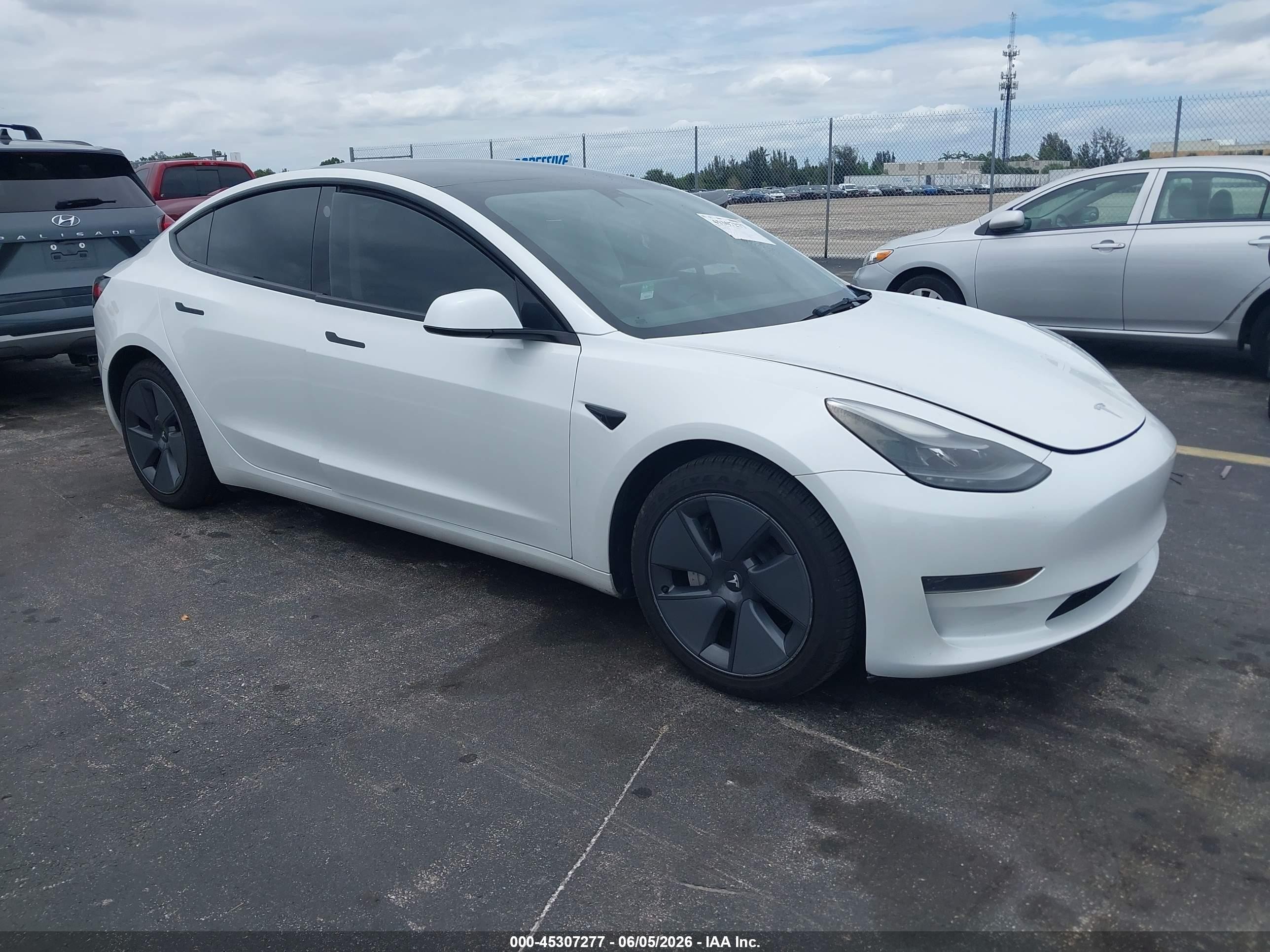 2023 Tesla Model 3, VIN 5YJ3E1EA8PF474229 — Water / flood