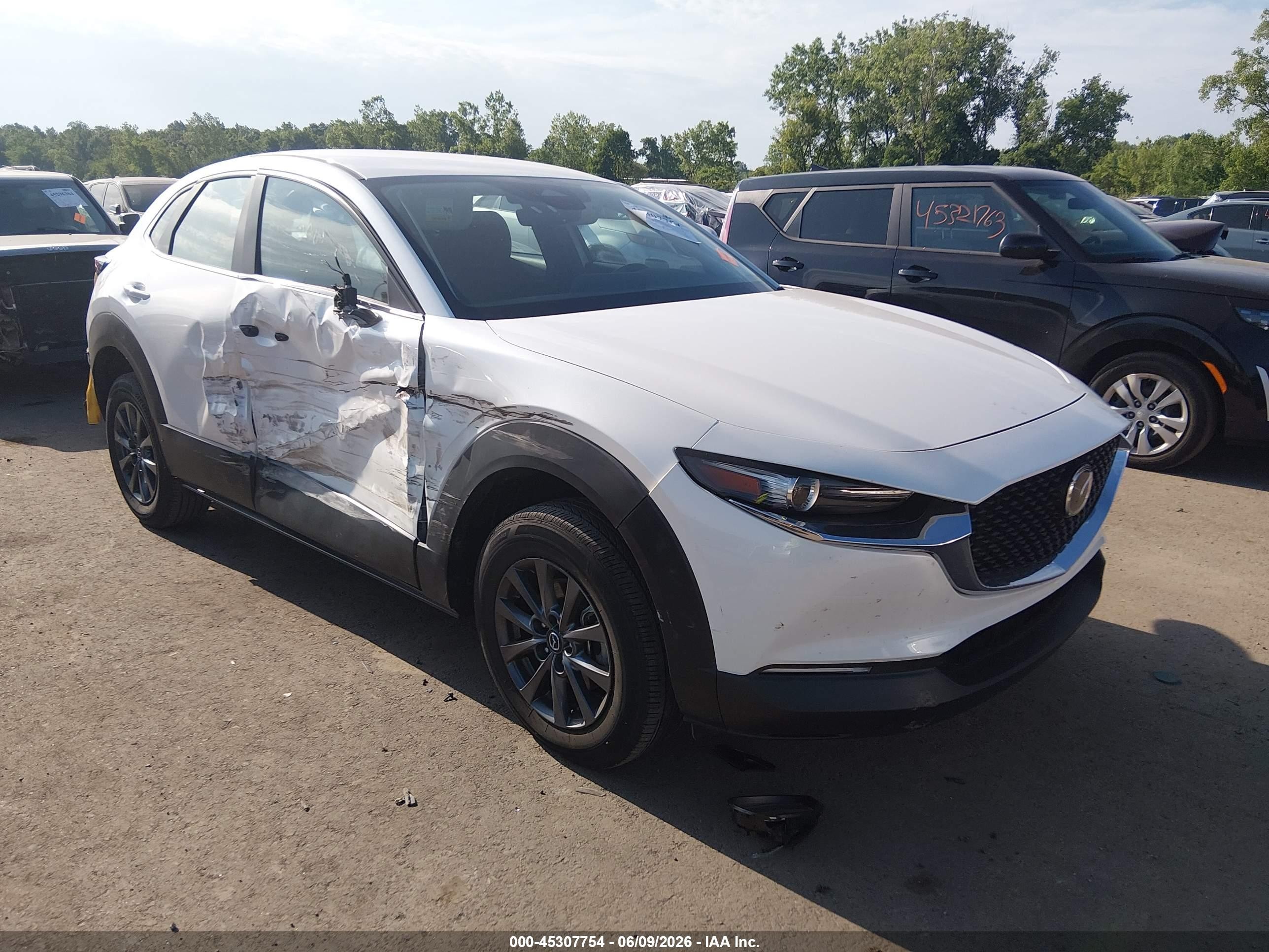 2024 Mazda CX-30 S, VIN 3MVDMBAMXRM647887 — Side