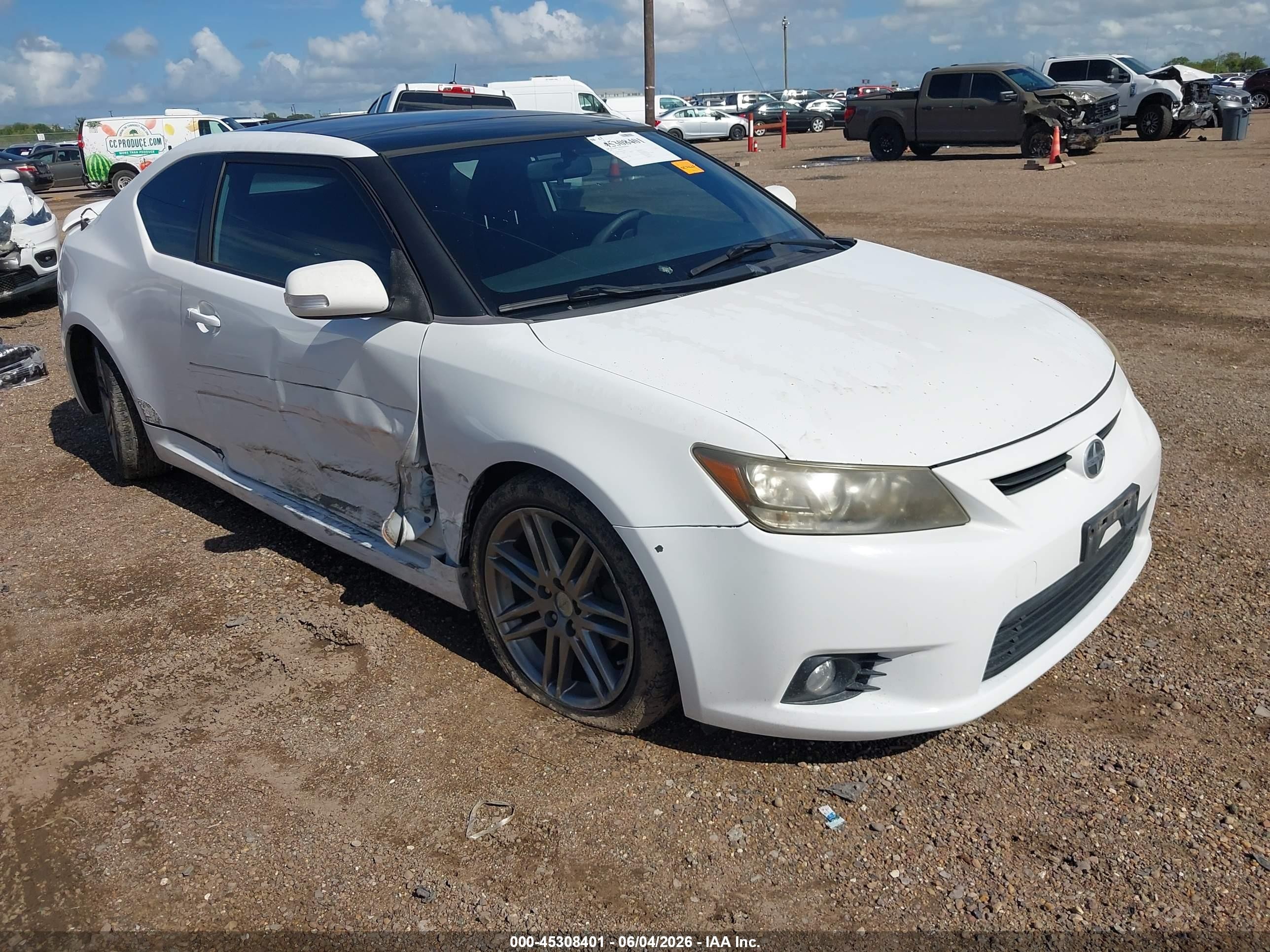 2011 Scion tC, VIN JTKJF5C70B3019652 — Side