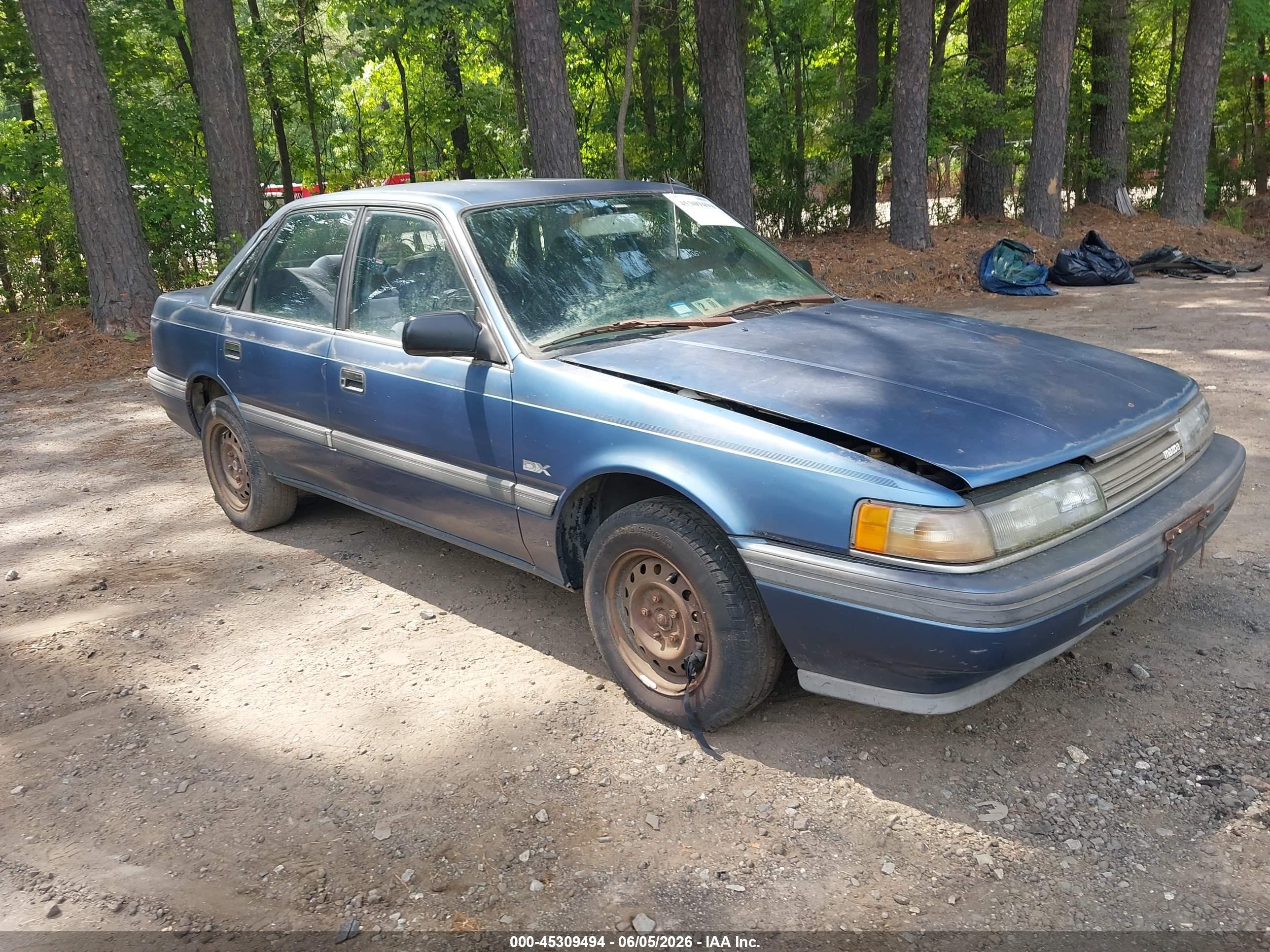 1990 Mazda 626, VIN JM1GD2220L1812877 — Normal wear