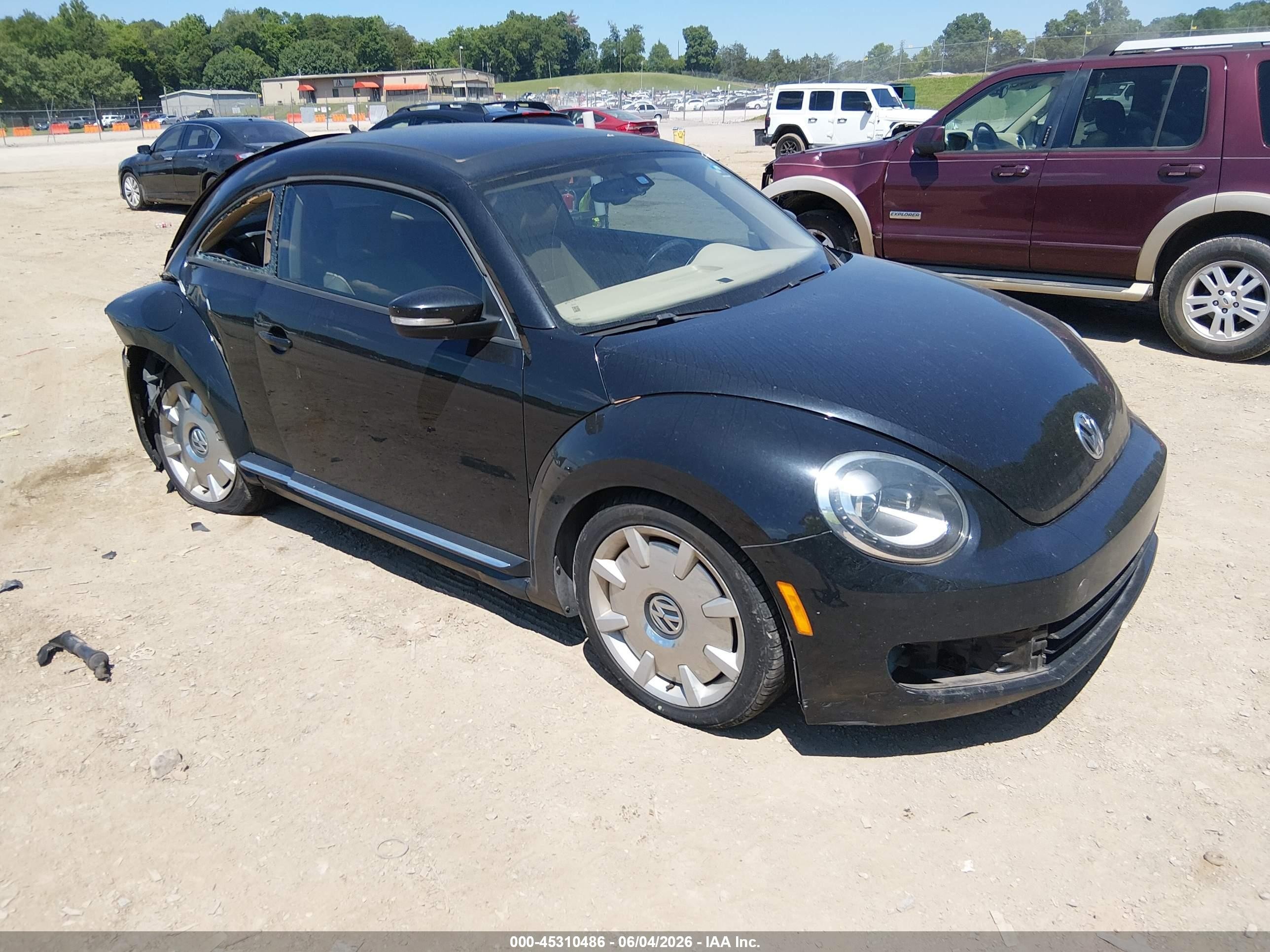 2016 Volkswagen Beetle SE, VIN 3VWJ07AT5GM635497 — Rear end