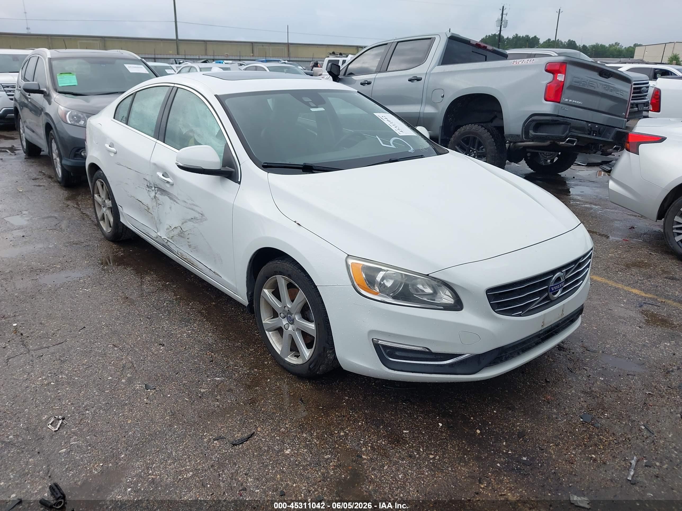 2016 Volvo S60 T5 Drive-E Premier, VIN YV126MFK0G1399823 — Side