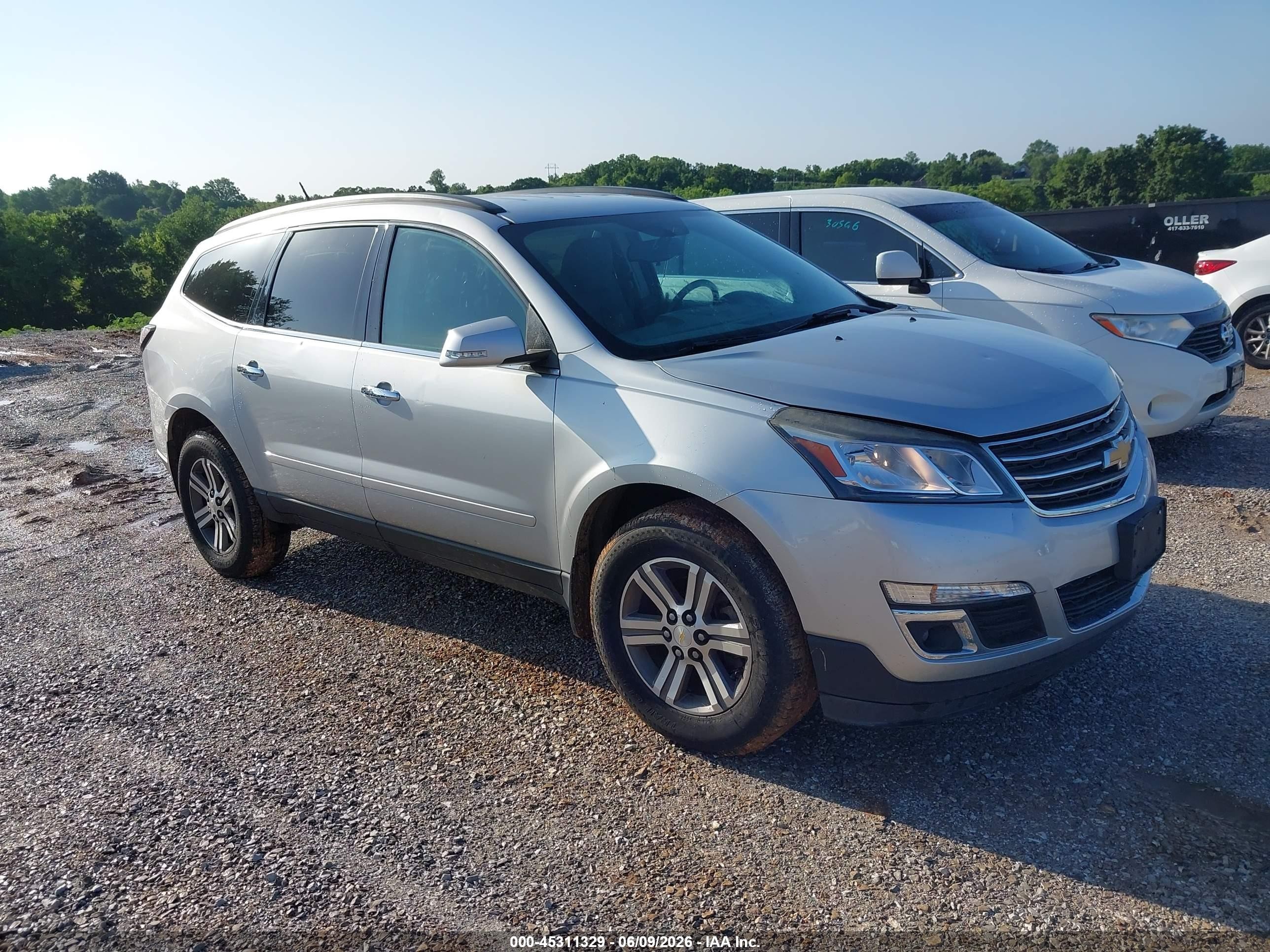 2017 Chevrolet Traverse LT, VIN 1GNKRGKD6HJ239749 — Hail