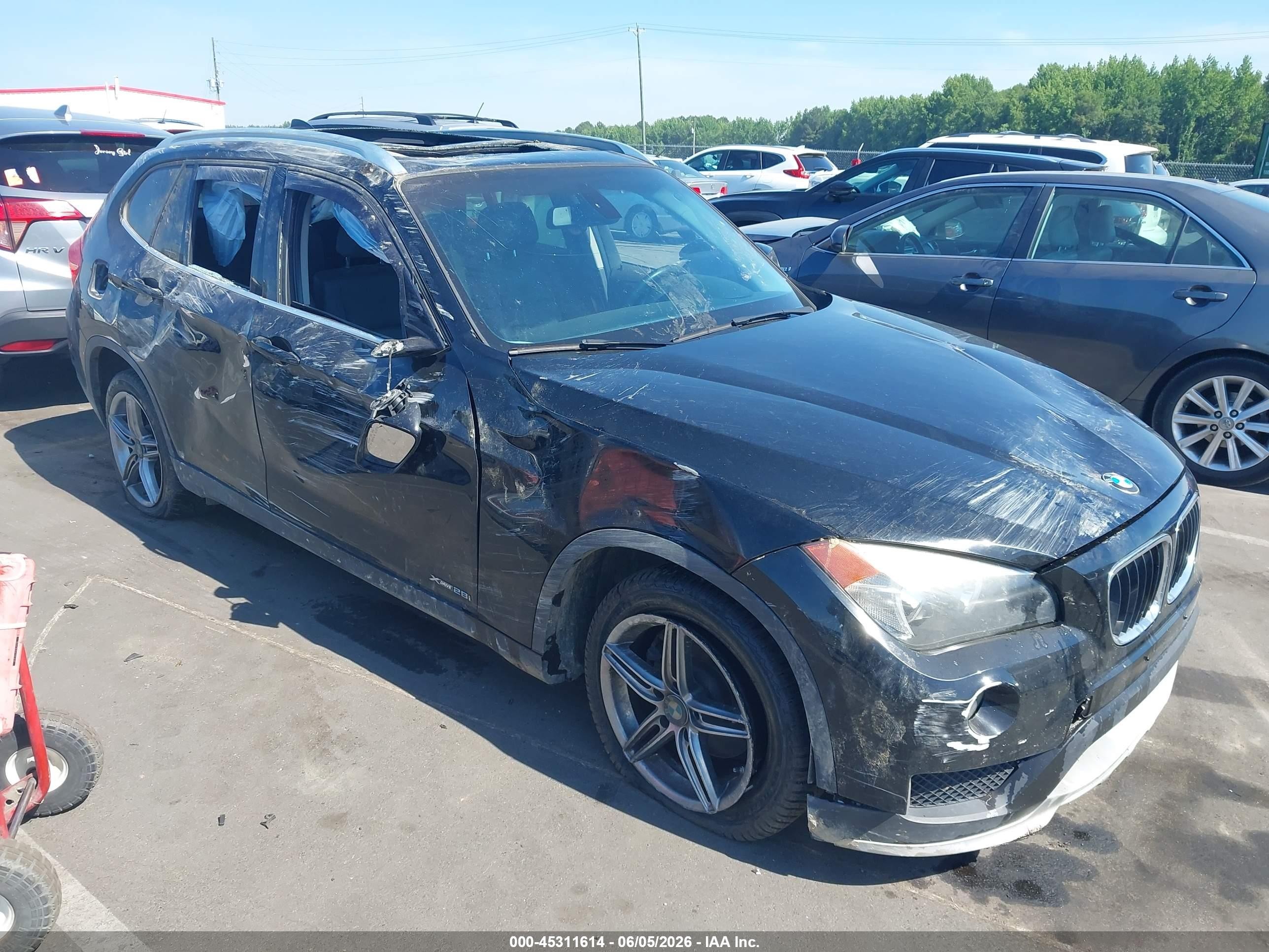 2015 BMW X1 xDrive28i, VIN WBAVL1C55FVY34204 — Normal wear