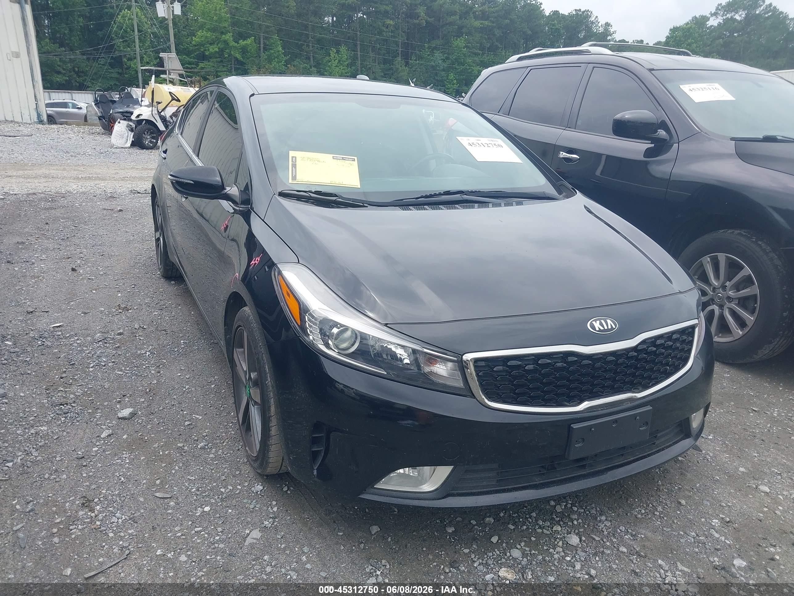 2017 Kia Forte EX, VIN 3KPFL4A80HE004968 — Side