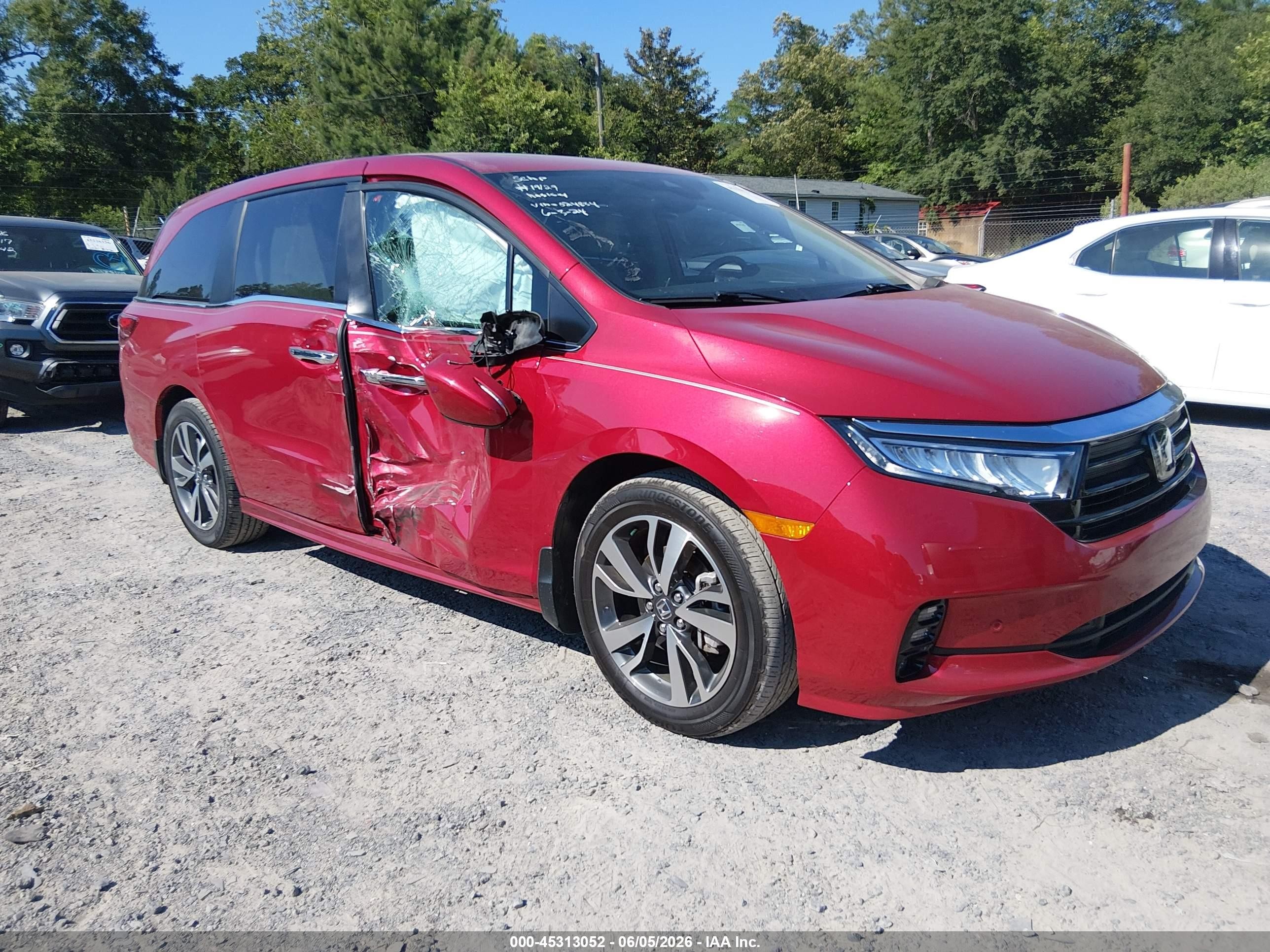 2023 Honda Odyssey Touring, VIN 5FNRL6H83PB024834 — Side