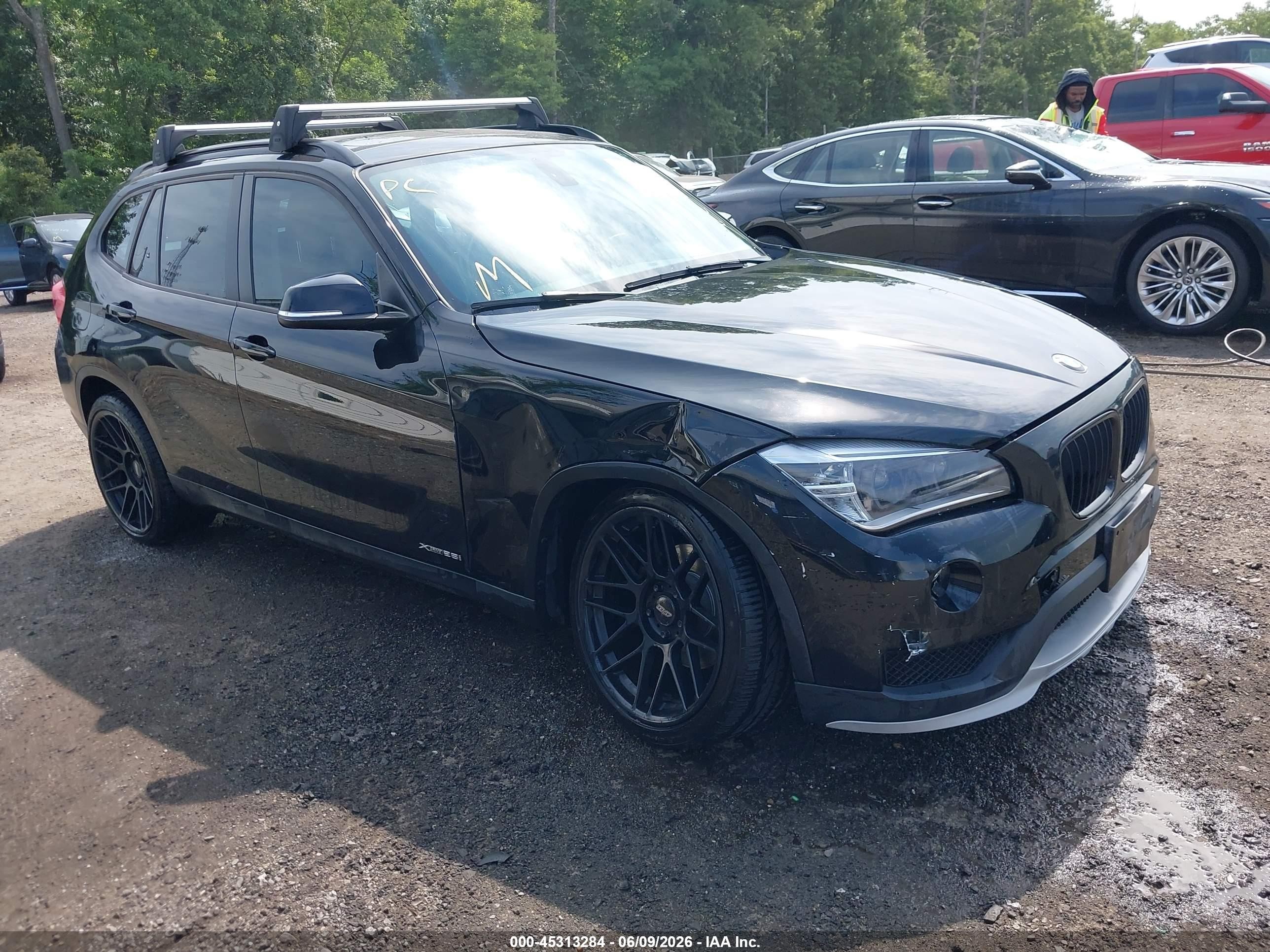 2015 BMW X1 xDrive28i, VIN WBAVL1C50FVY38645 — Front end
