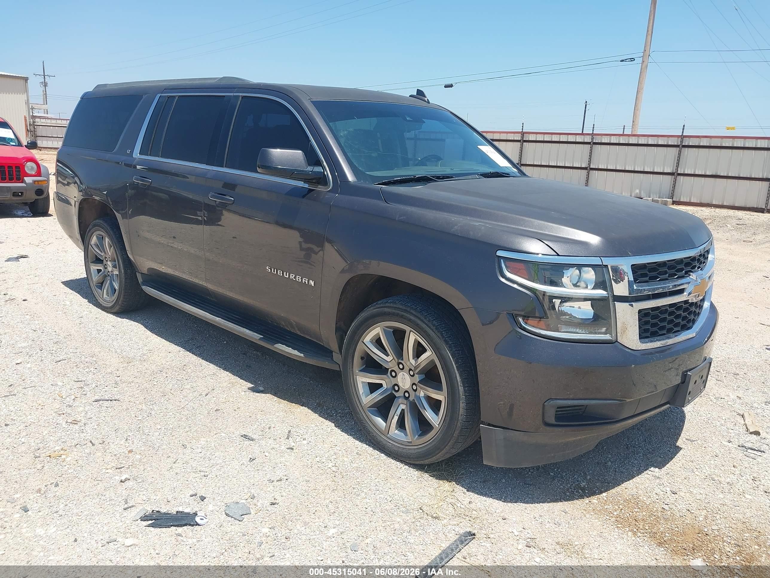 2017 Chevrolet Suburban LT, VIN 1GNSCHKC6HR401315 — Side