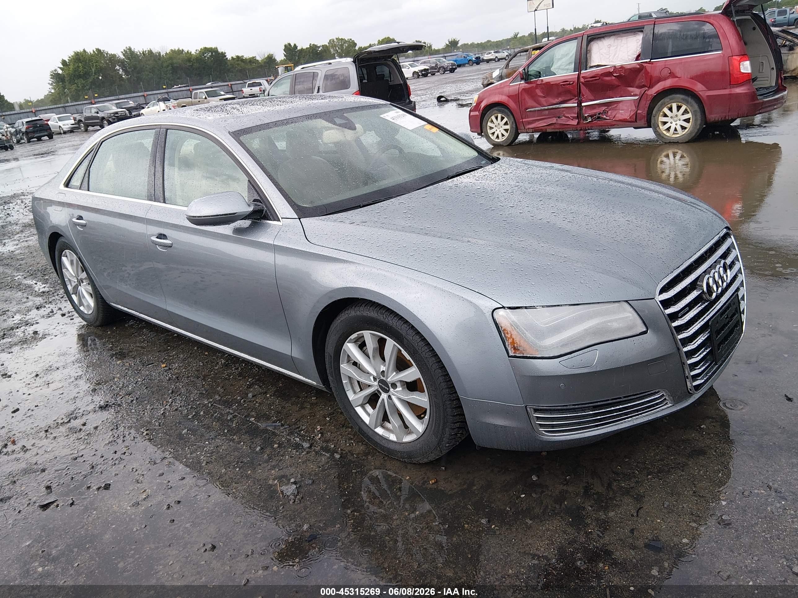 2013 Audi A8 3.0L, VIN WAURGAFD8DN021283 — Side