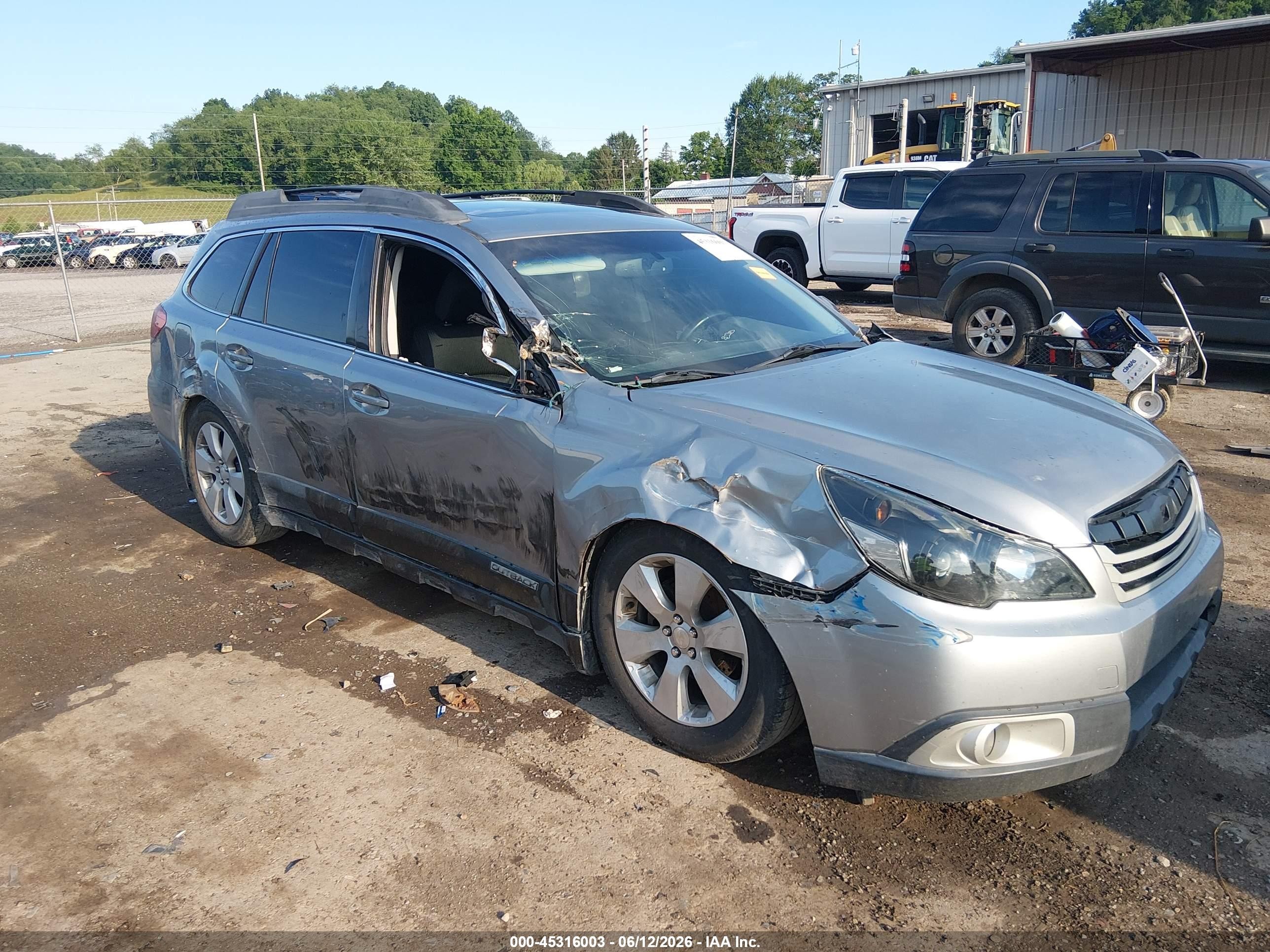 2011 Subaru Outback Premium, VIN 4S4BRBGC3B3318590 — Side