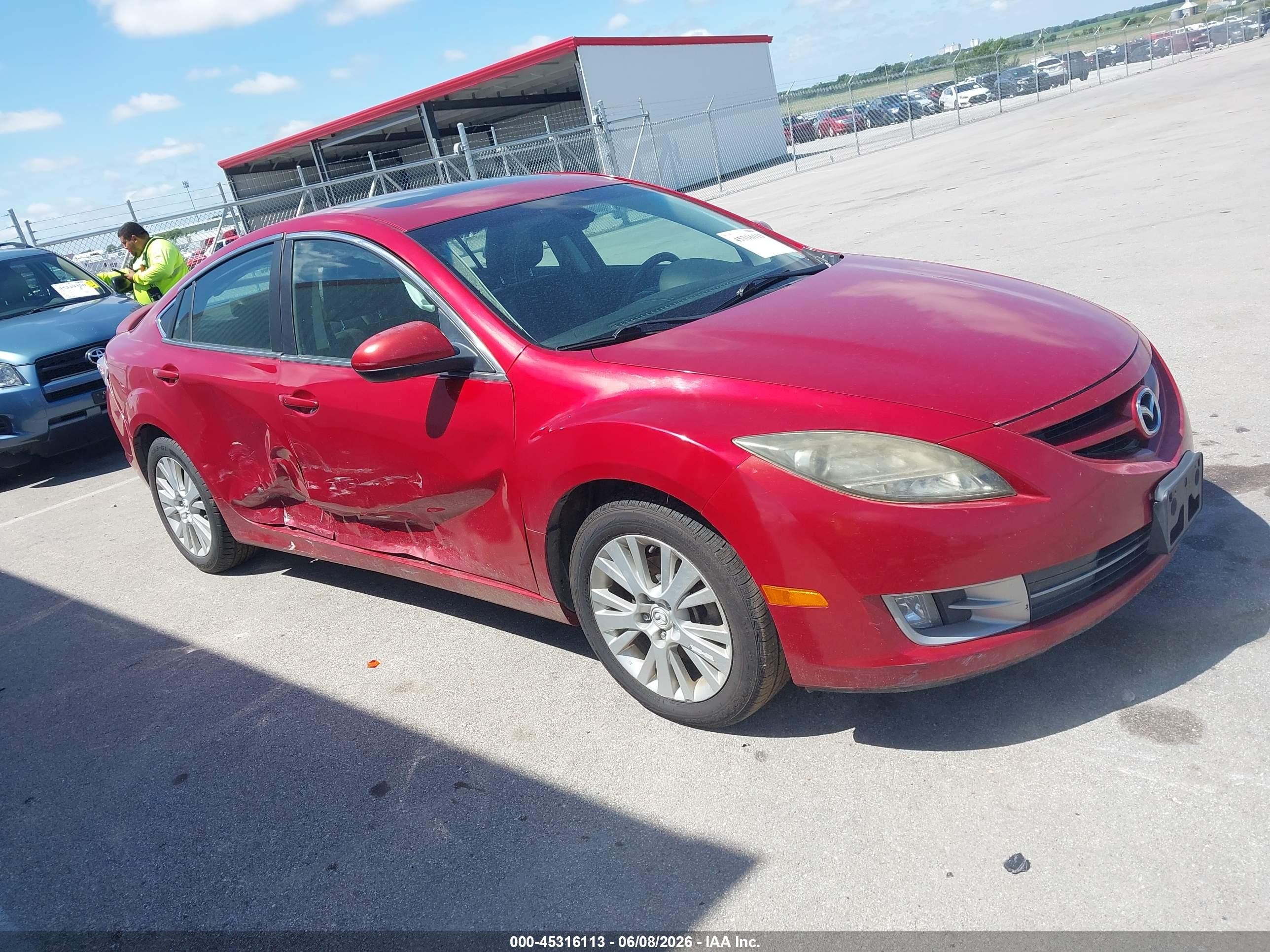 2009 Mazda 6 i Touring, VIN 1YVHP82A695M23694 — Бок
