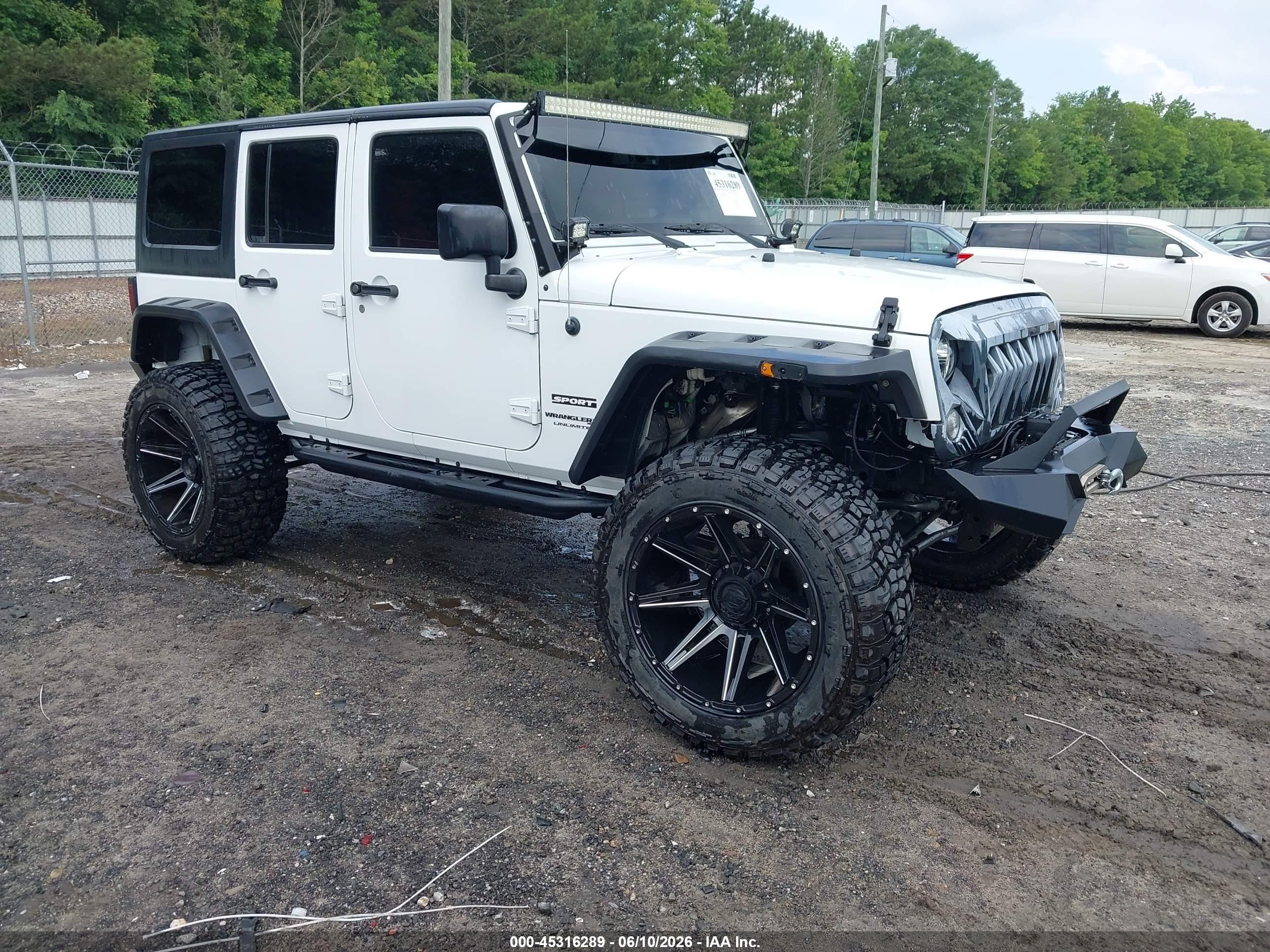 2018 Jeep Wrangler Unlimited Sport S, VIN 1C4BJWDG2JL808446 — Side