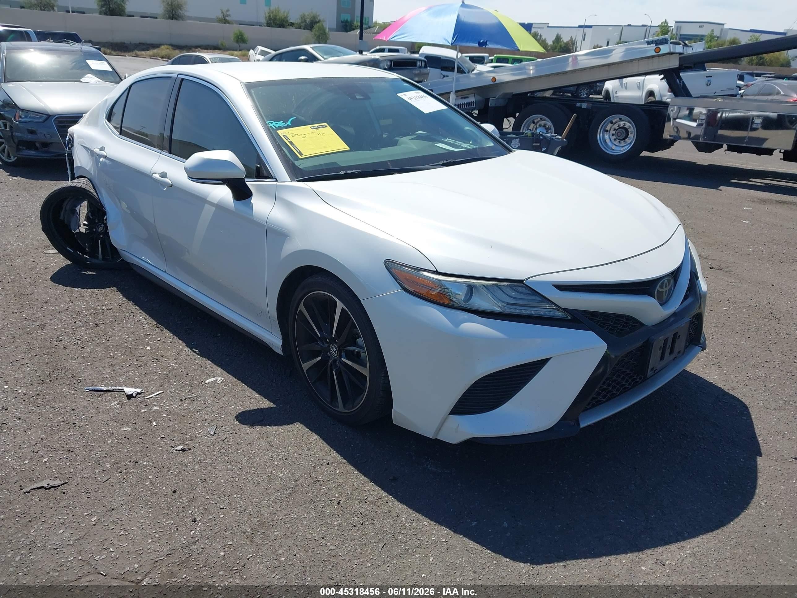 2019 Toyota Camry XSE, VIN 4T1B61HK1KU835180 — Rear end