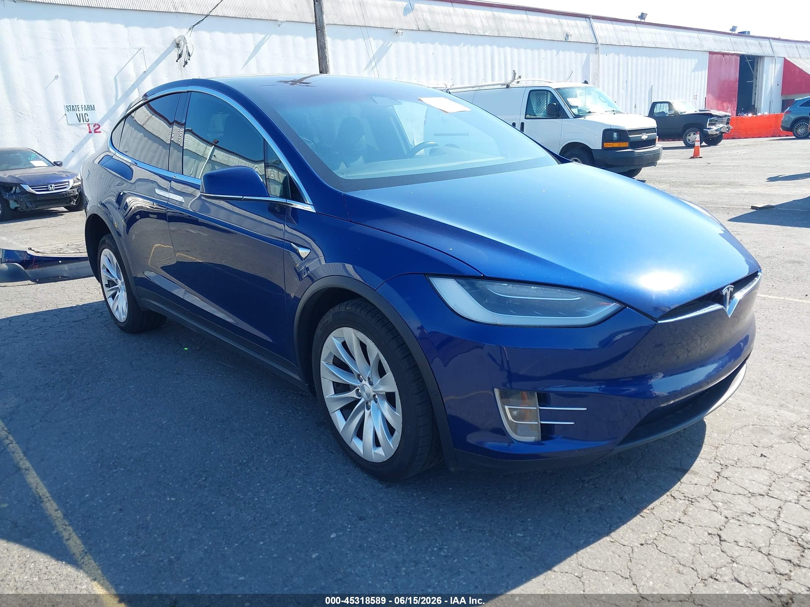 2018 Tesla Model X 75D, VIN 5YJXCDE20JF114123 — Rear end
