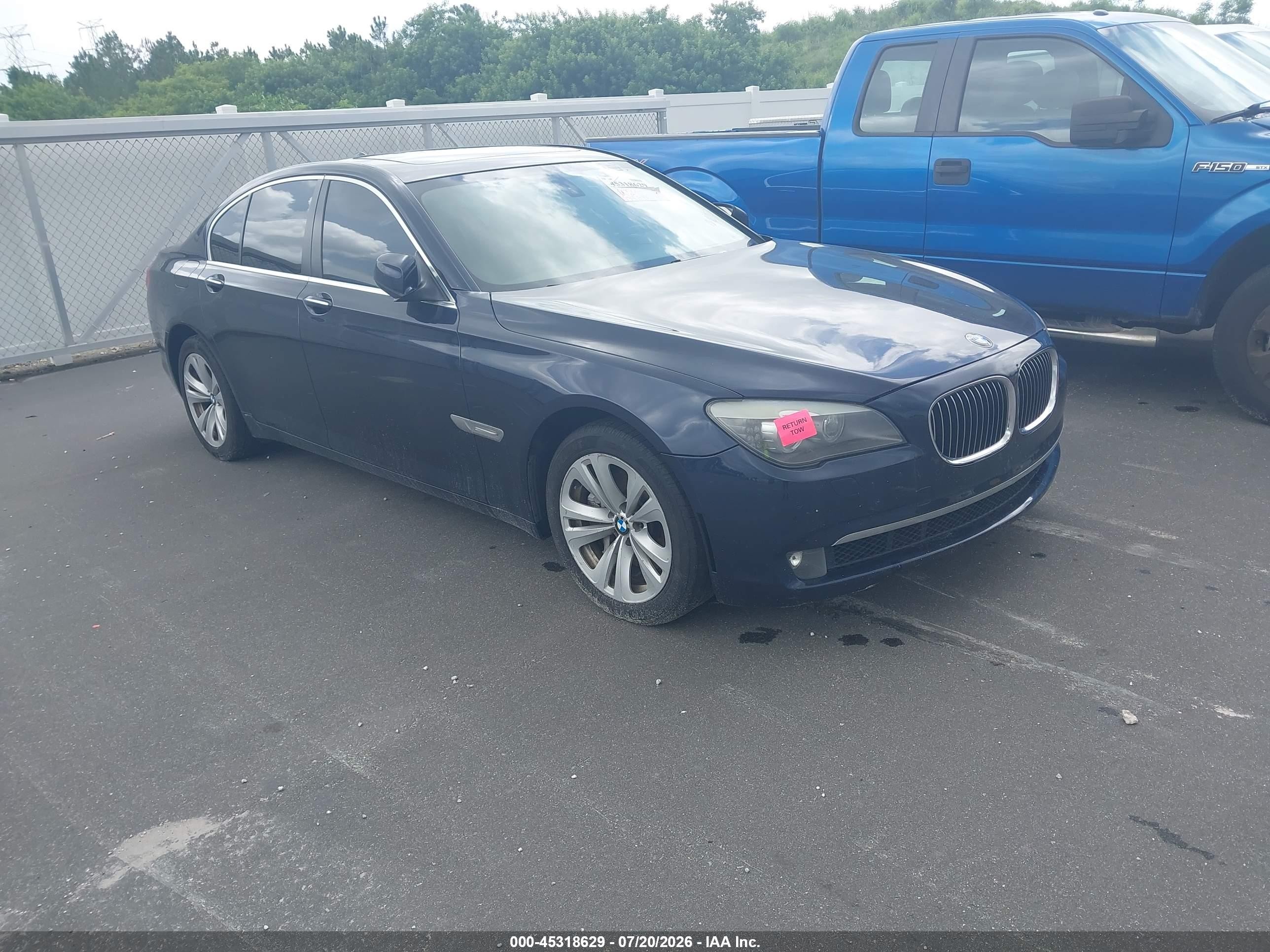 2011 BMW 7 Series 740i, VIN WBAKA4C51BC612680 — Normal wear