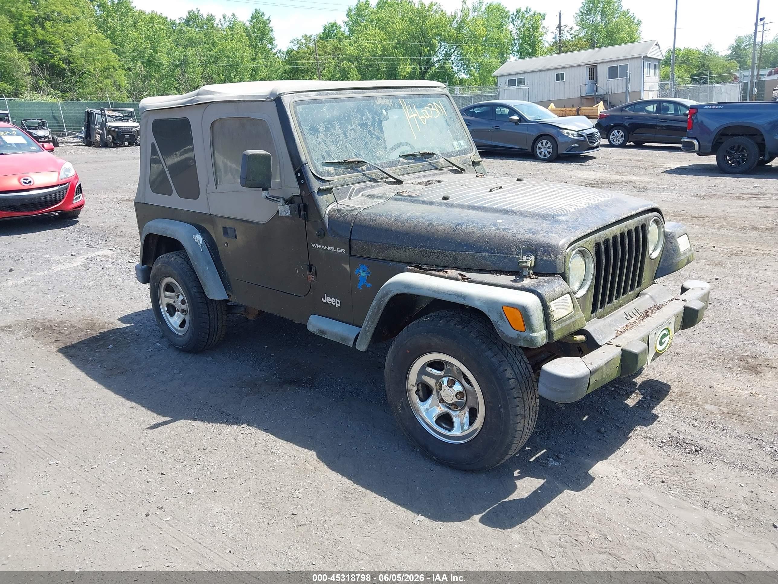 2002 Jeep Wrangler X, VIN 1J4FA39S52P754304 — Normal wear