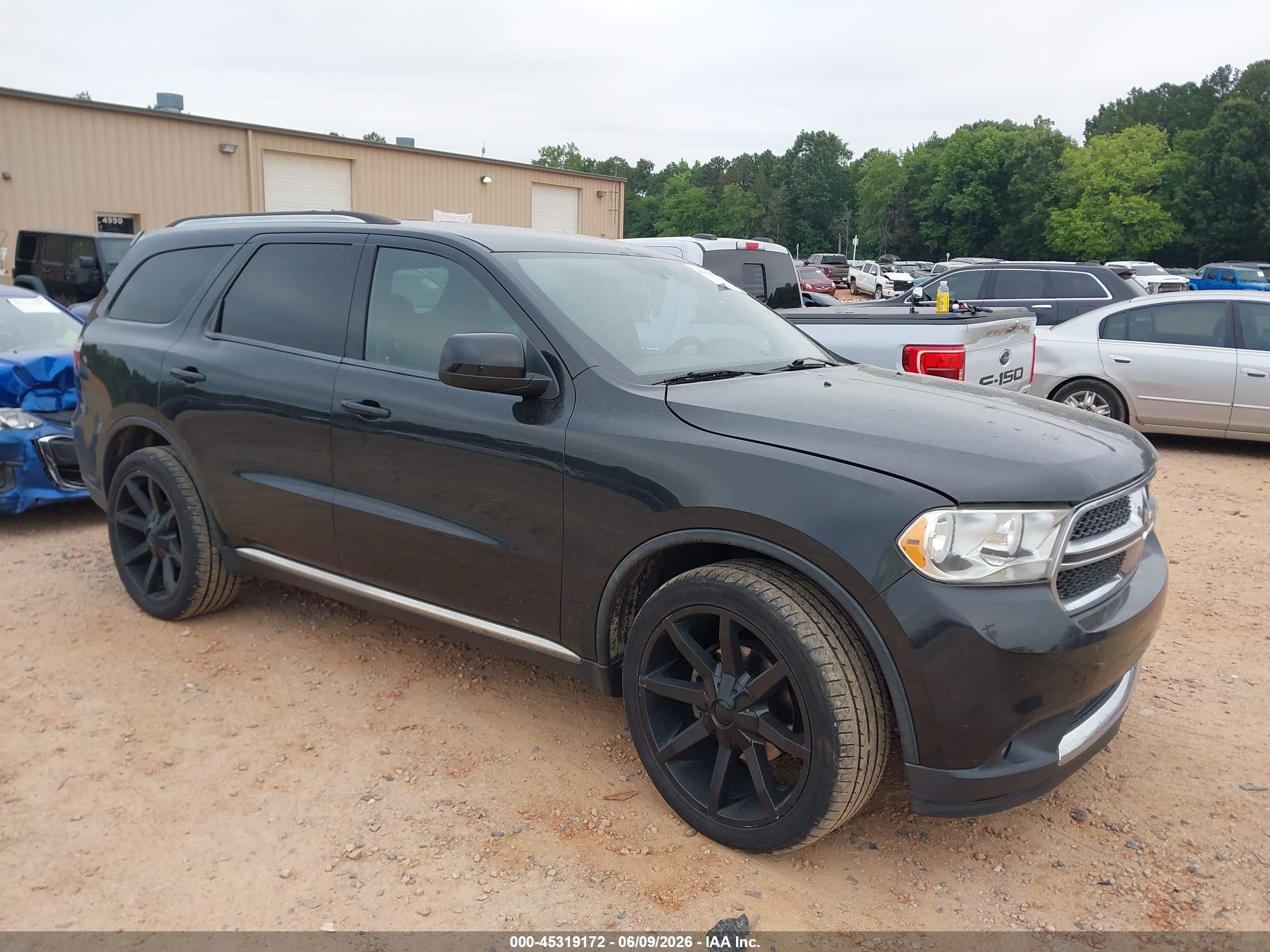 2013 Dodge Durango SXT, VIN 1C4RDJAG0DC512486 — Side