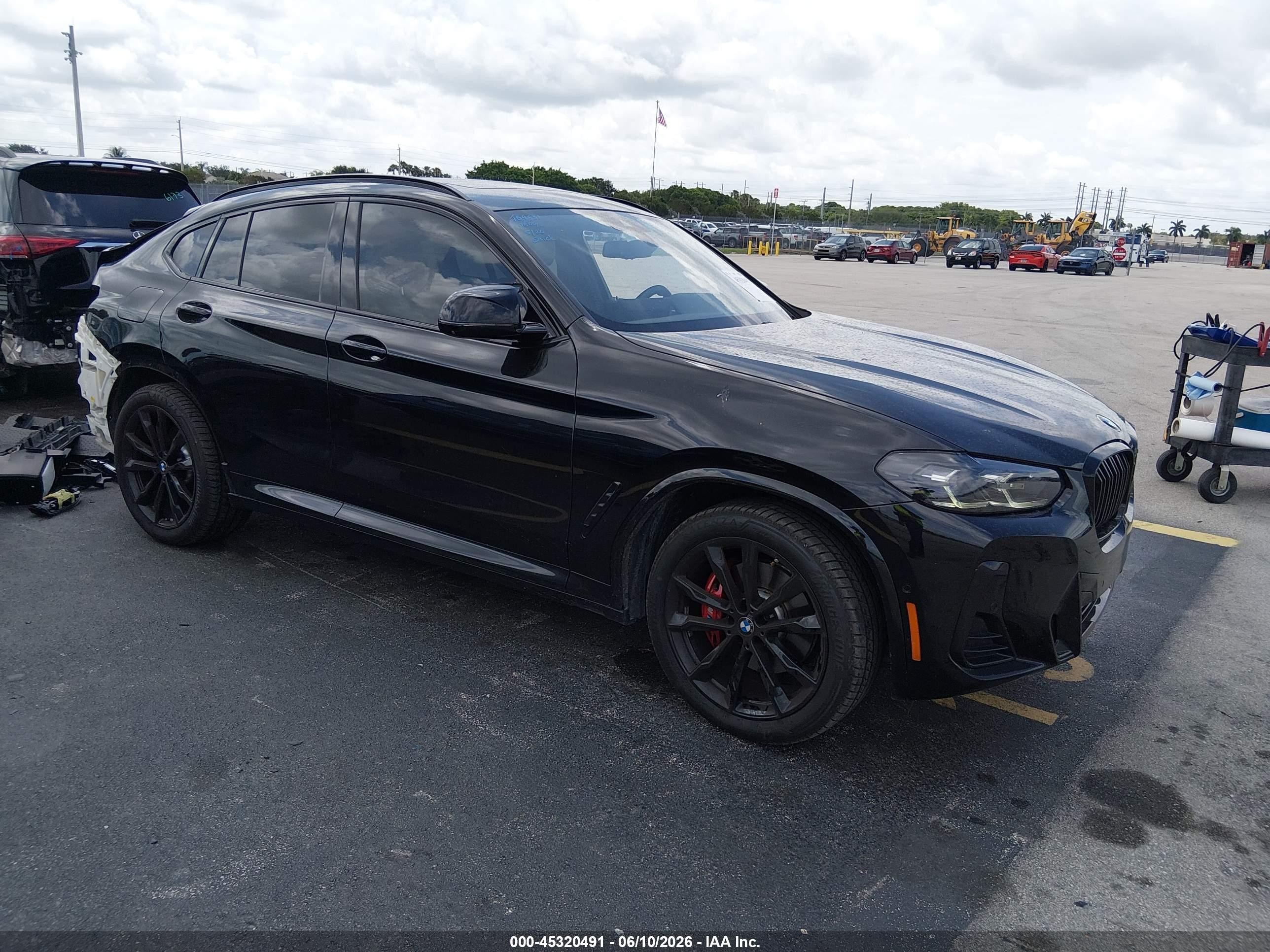 2022 BMW X4 M40i, VIN 5UX43DT04N9K99831 — Rear end