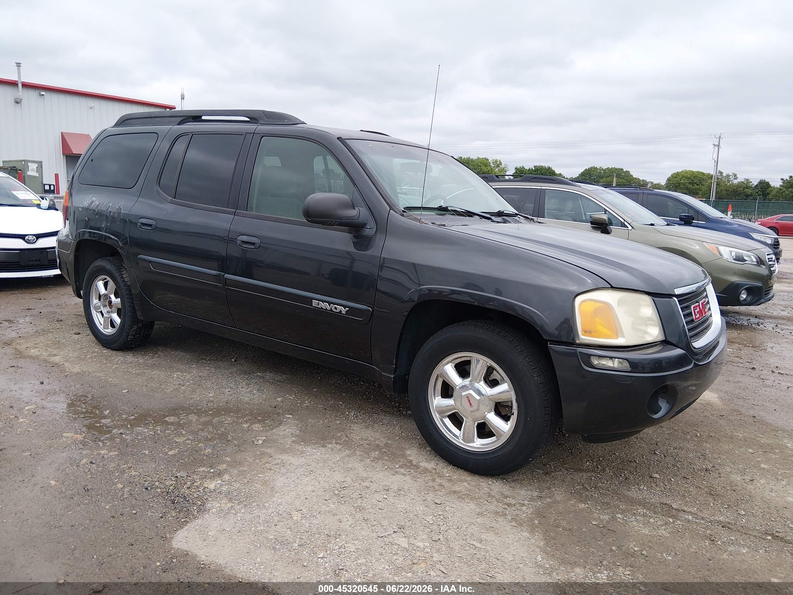 2003 GMC Envoy SLT, VIN 1GKES16S636211207 — Hail