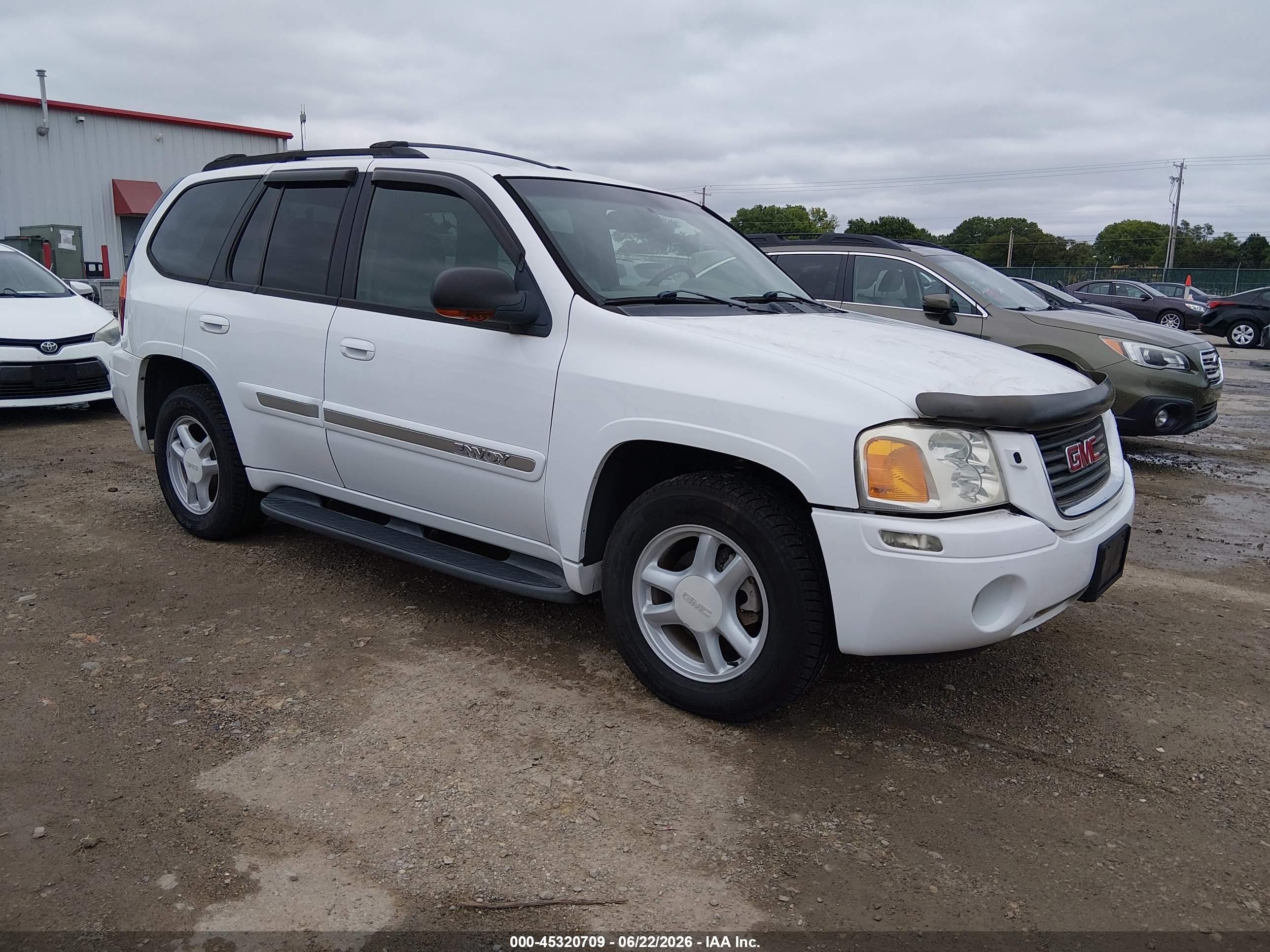 2002 GMC Envoy SLE, VIN 1GKDT13S522362932 — Hail