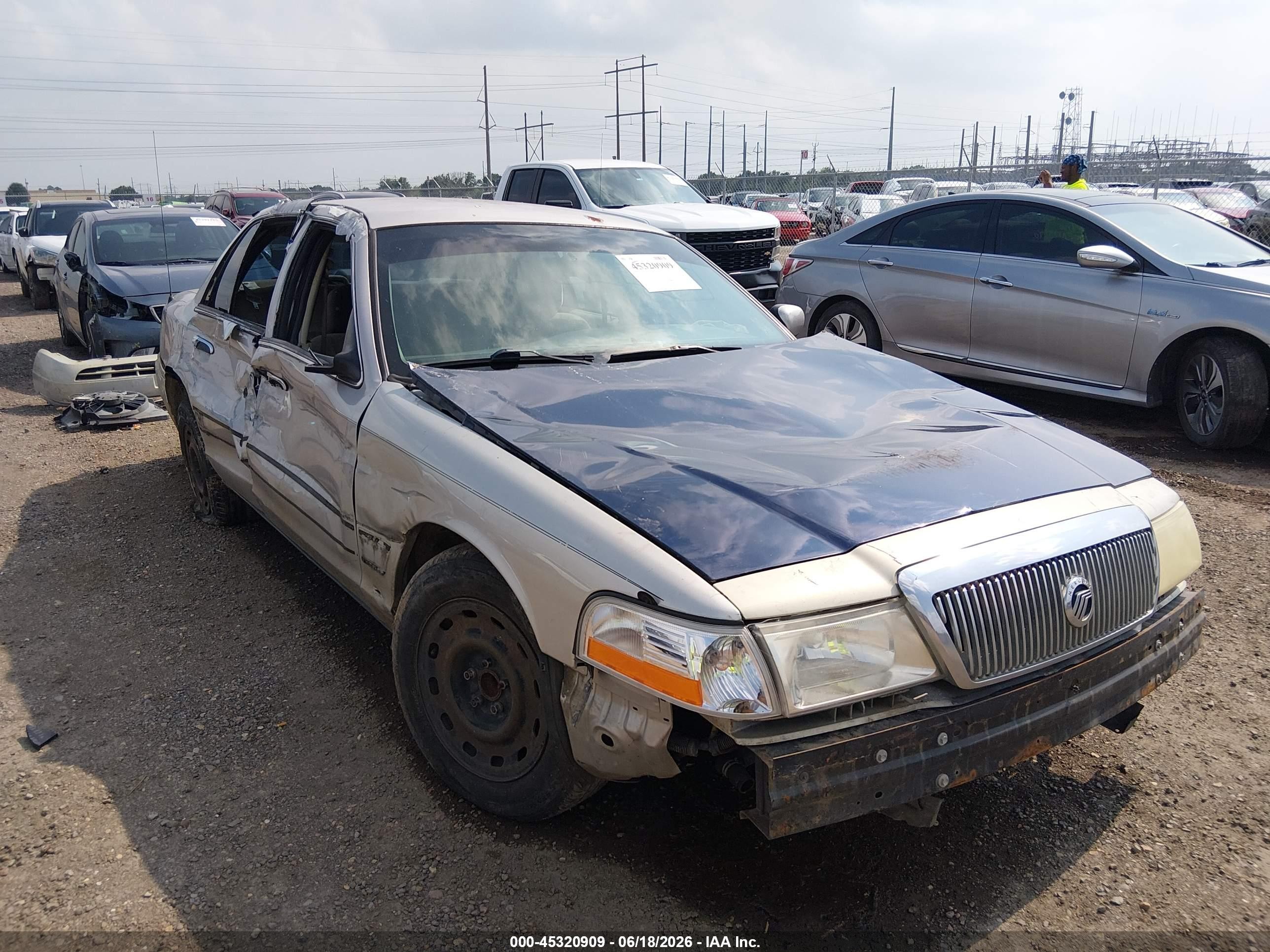 2005 Mercury Grand Marquis GS, VIN 2MEFM74W75X639831 — Side