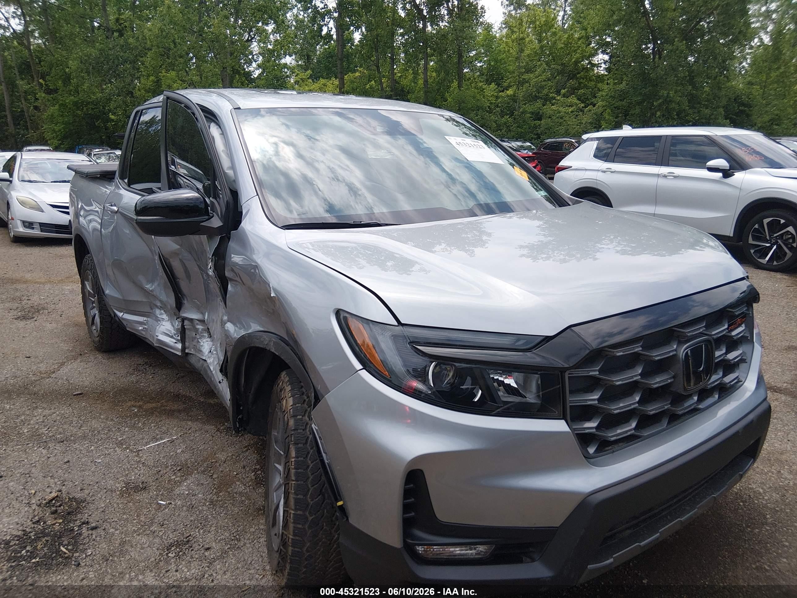 2024 Honda Ridgeline TrailSport, VIN 5FPYK3F61RB011556 — Side